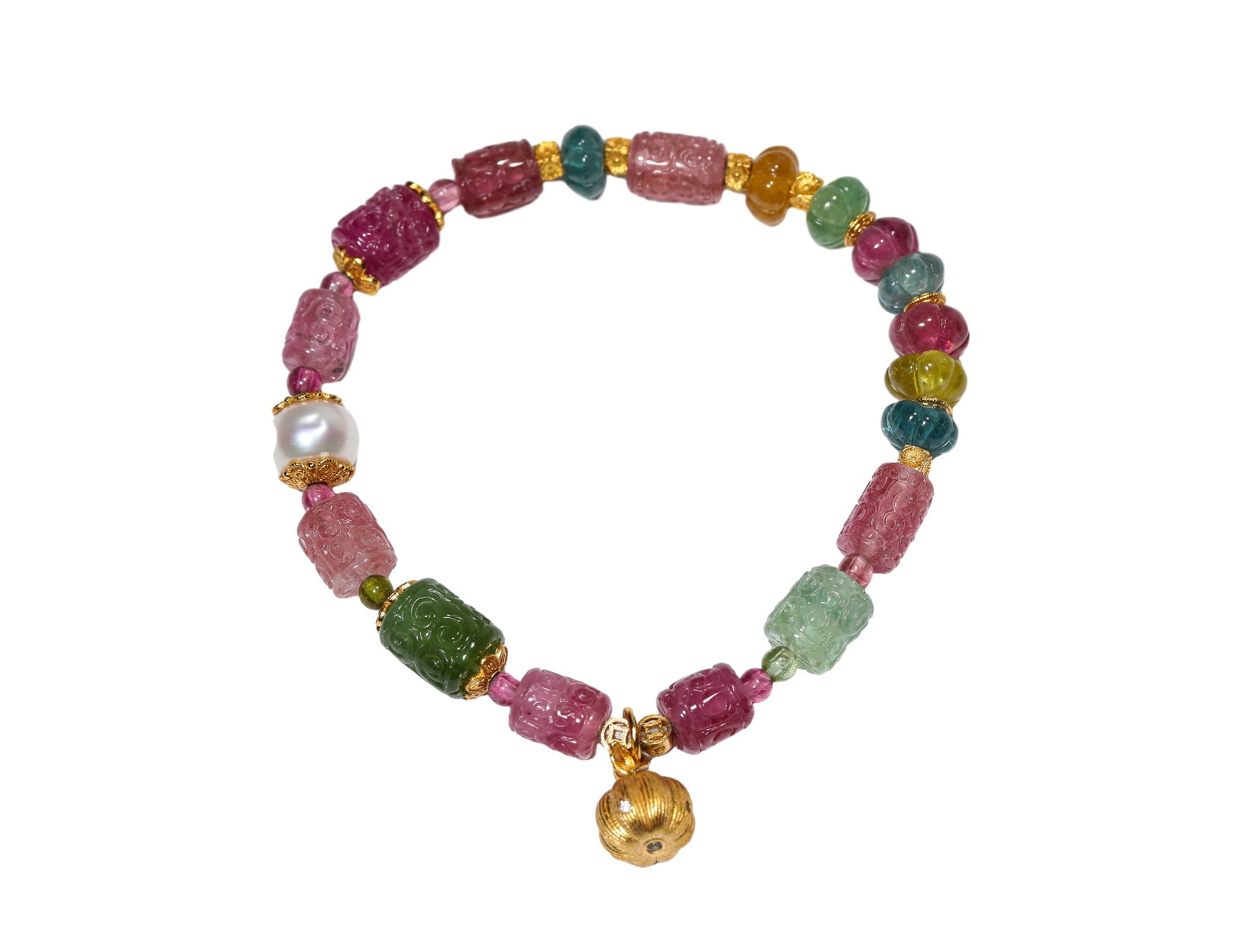 A TOURMALINE 'BEADS' BRACELET: A TOURMALINE 'BEADS' BRACELET Dimensions: Length: 8.8 cm (3.5 in.). All measurements are approximate.