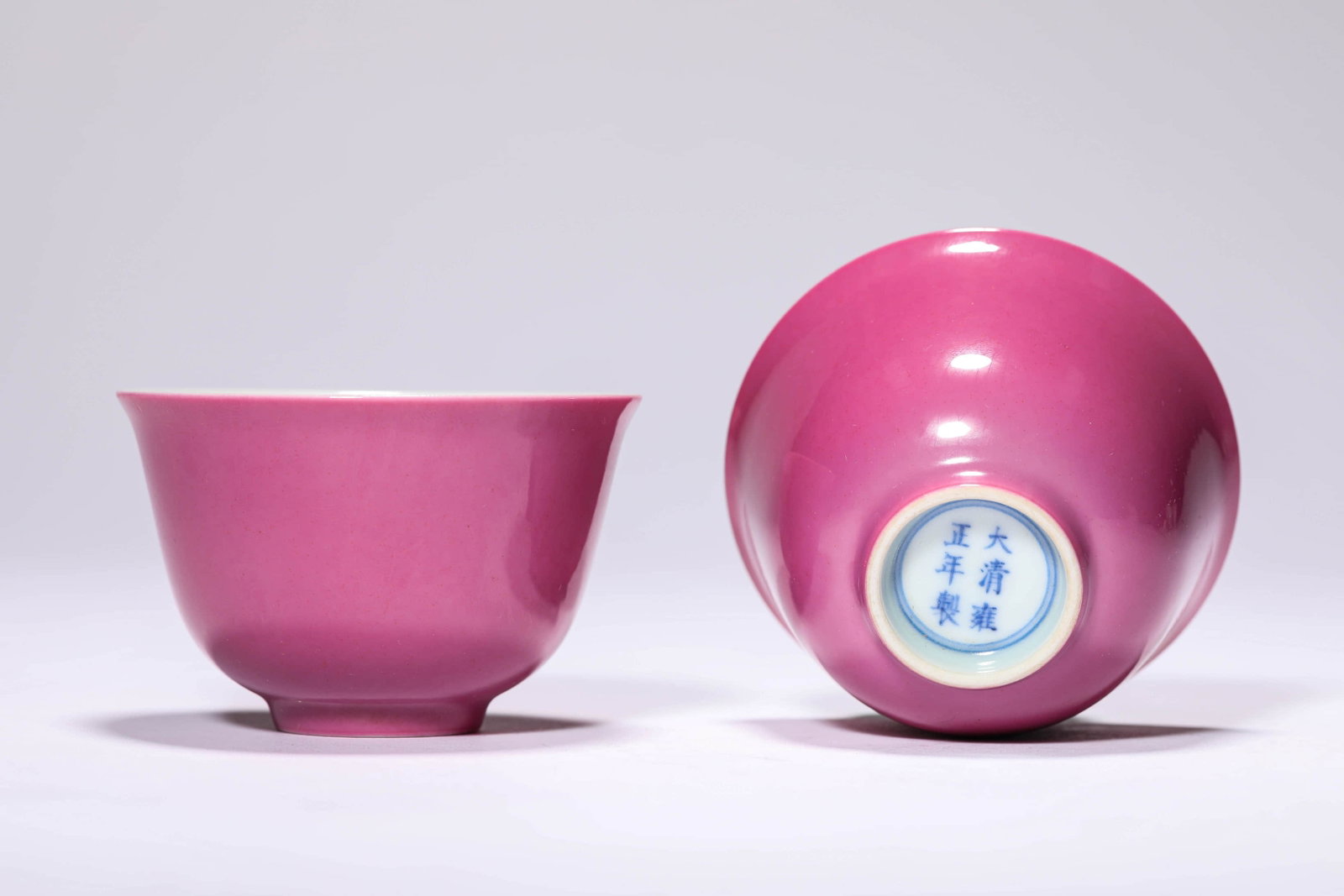 A PAIR OF RUBY-RED GLAZED 'PLAIN' CUPS - 2