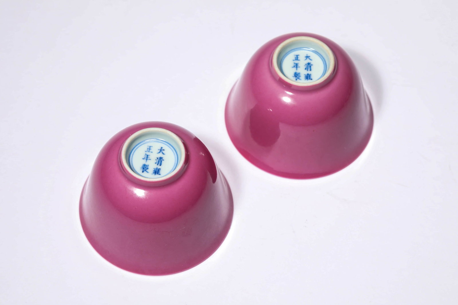 A PAIR OF RUBY-RED GLAZED 'PLAIN' CUPS - 3