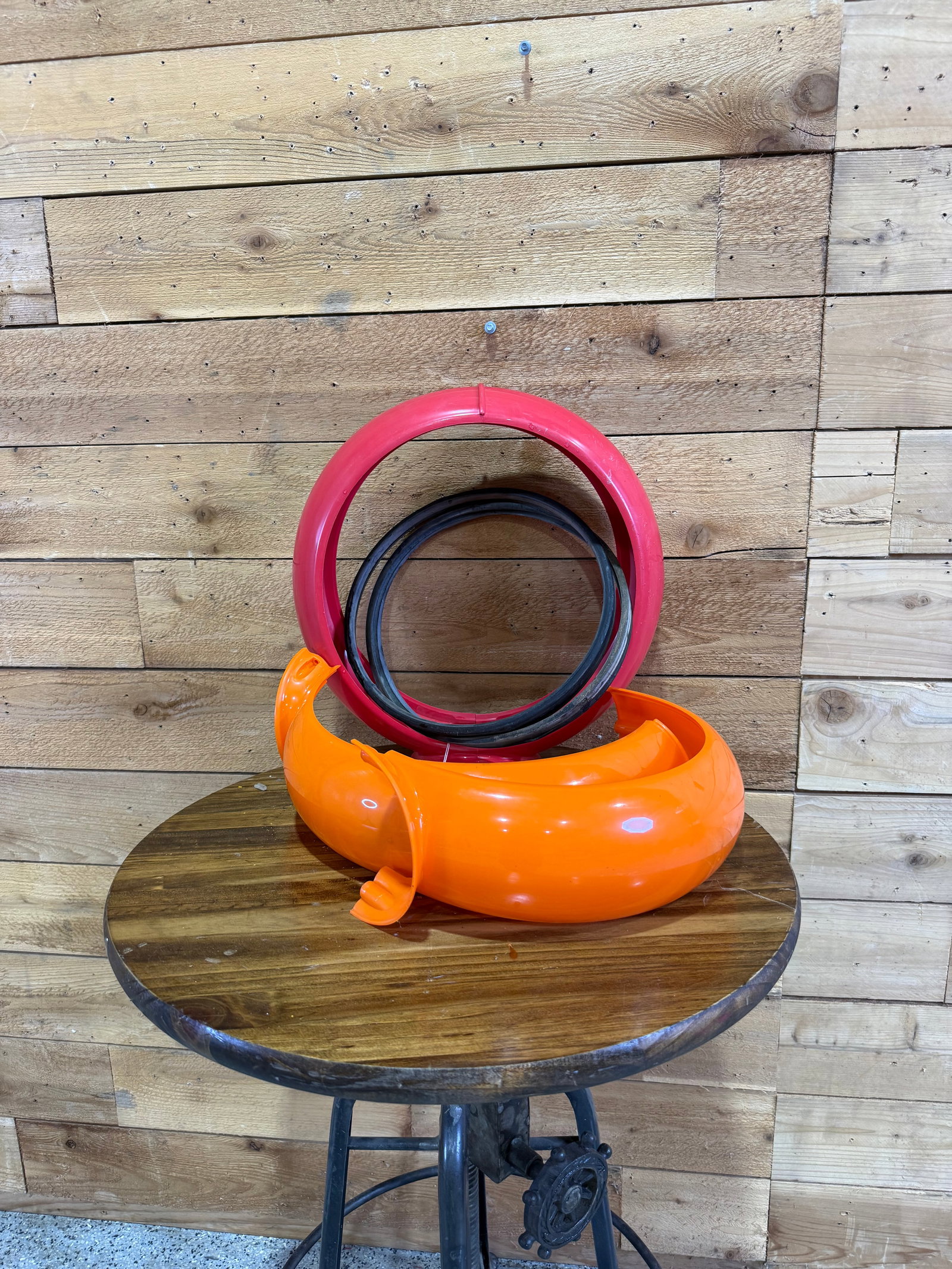 Set of two plastic pump globe Rims: A nice pair of vintage-style pump globe rims, perfect for restoration projects or display. Both are in good overall condition, showing light wear consistent with age and use. A great addition for coll