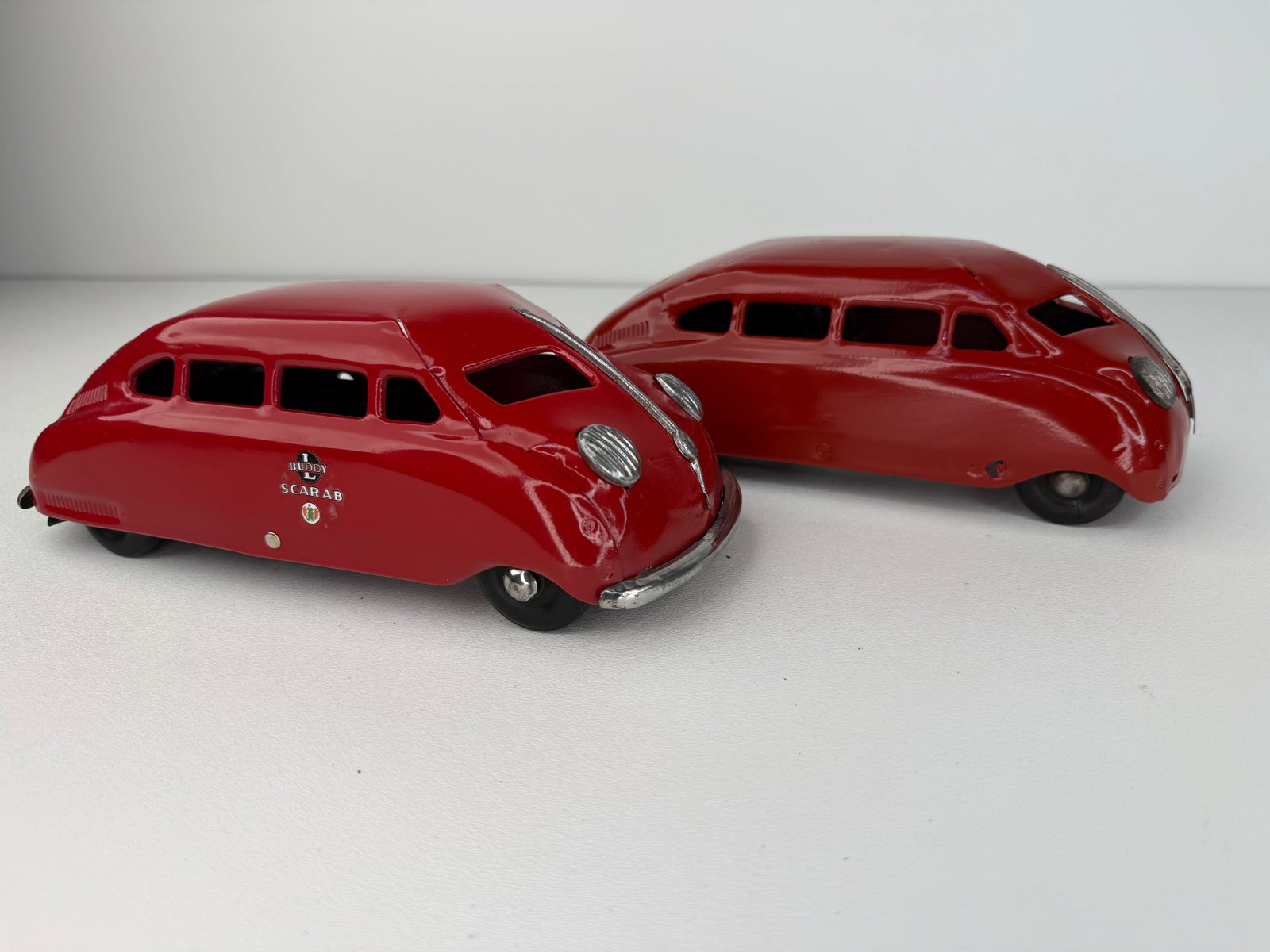 Pair of 1930s Buddy L Scarab pressed steel repainted toy cars (1 of 11)