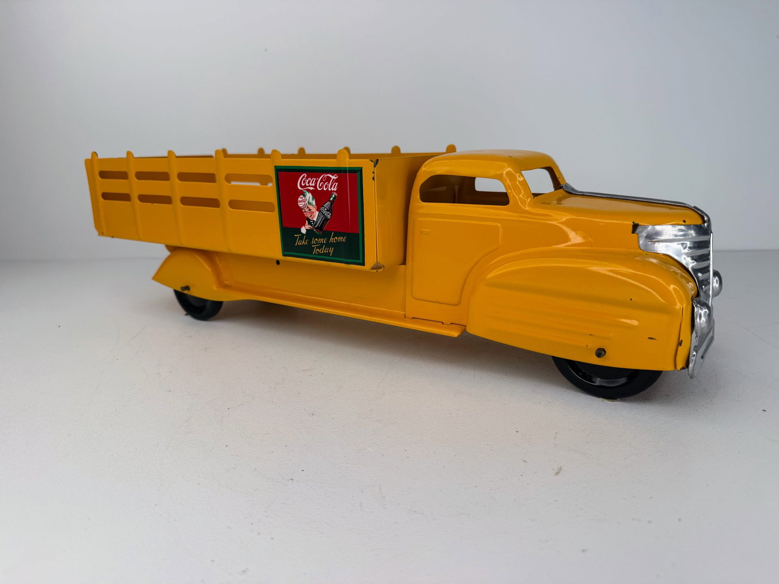 Louis Marx Coca Cola Pressed Steel Delivery Truck: 1940s Louis Marx Coca-Cola pressed steel delivery truck. This classic vintage truck has been fully repainted and is in great overall condition. A wonderful addition to any Louis Marx, Coca-Cola, or vi