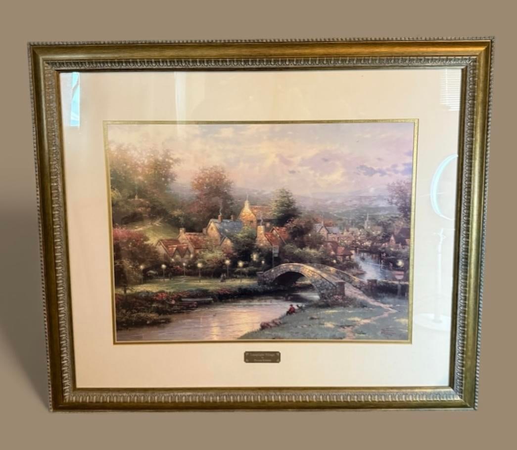 "Lamplight Village" By Thomas Kinkade Lithograph Limited Edition 1600/3850 COA Professionally Framed: 199 "Lamplight Village" By Thomas Kinkade 35"x30.5" Lithograph Professionally Framed and Matted with UV resistant glass and acid free materials. Museum quality framing. Limited Edition 1600/3850 COA.