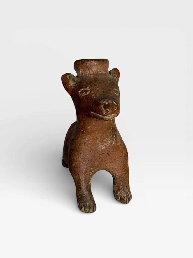 247 Attractive Colima Pottery Seated Dog Taper Candle Holder: Attractive Colima Pottery Seated Dog tomb pottery (100 bc to 400ce) This ancient artifact has a beautiful reddish brown surface color with magnets deposits and some root marks, age, cracks. Hydrogen p