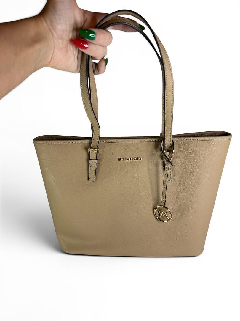 Michael Kors JET SET Camel Top Zip tote Leather Brand New with Tags and Bag Charm 298 USD: LOT 26 Michael Kors; JET SET Camel Top Zip tote Leather NWOT MSRP $298.00 SKU 196237383075; Included: Care Instructions, Bag Charm
