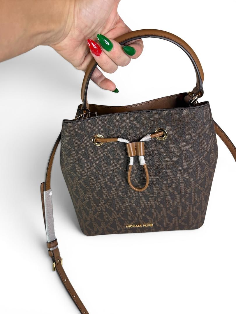 Michael Kors SURI Brown Luggage Medium Bucket Messenger Bag Brand New with Tags 298 USD: LOT 29 Michael Kors; SURI Brown Luggage Medium Bucket Messenger Bag NWOT MSRP $298.00 SKU 196163534404