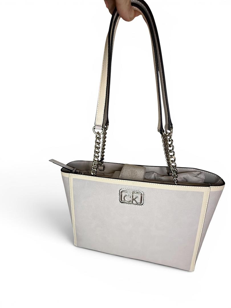 Calvin Klein Grey and White Medium Monogram Tote Handbag Key Strap and Care Card Included Brand New: LOT 88 Calvin Klein; Style# H3JADWX1 Grey/White Medium Monogram Tote Handbag NWOT MSRP $228.00 UPC 197383730539; Included: Key Strap, Care Card