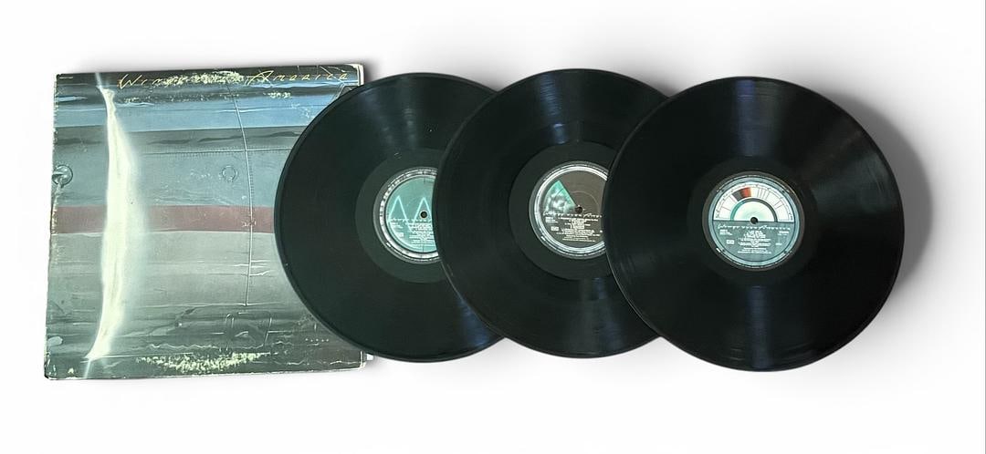 Wings Wings Over America 1976 Vinyl Record 3 LPs: LOT 132ARTIST: WINGS TITLE: WINGS OVER AMERICARELEASED: 1976CATALOG #: SWCO-11593FORMAT: Vinyl 12" GENRE: ROCK, POPTRACK LIST:LP 1Side A 1 Venus and Mars / Rock Show / Jet 2 Let Me Roll It 3 Spirits o