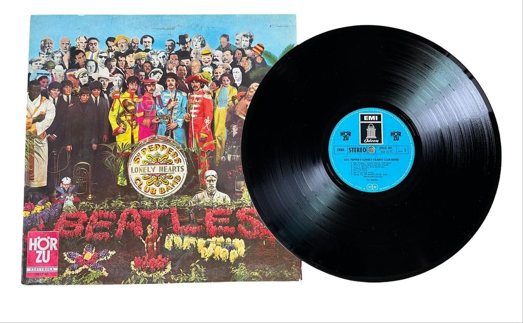 GERMAN PRESSING The Beatles Sgt Peppers Lonely Hearts Club Band LP Vinyl Record: LOT 119ARTIST: The BeatlesTITLE: Sgt. Pepper's Lonely Hearts Club BandRELEASED: 1967CATALOG #: SHZE 401FORMAT: Vinyl 12"GENRE: RockTRACK LIST:A1. Sgt. Pepper's Lonely Hearts Club BandA2. With A Little