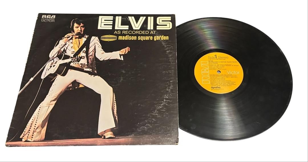 Elvis Presley As Recorded at Madison Square Garden Vinyl Record LP: LOT 132ARTIST: Elvis Presley TITLE: Elvis As Recorded At Madison Square Garden RELEASED:1972CATALOG #: LSP-4776 FORMAT: Vinyl 12" GENRE: Rock TRACK LIST:A1.You Don't Have to Say You Love MeAb. You've 