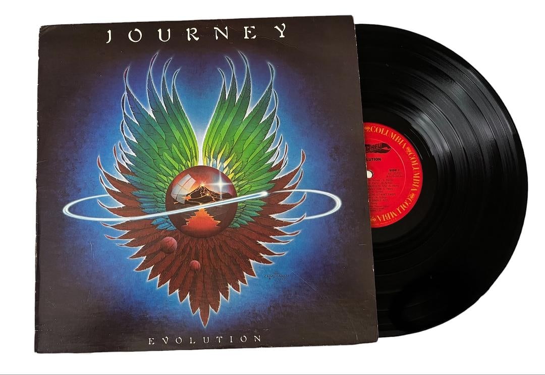 Journey Evolution LP Vinyl Record: LOT 136ARTIST: Journey TITLE: Evolution RELEASED: 1979 CATALOG #: FC 35797FORMAT: Vinyl 12" GENRE: Funk, Soul, Pop TRACK LIST:A1. Majestic (1:16)A2. Too Late (2:57)A3. Lovin', Touchin', Squeezin'