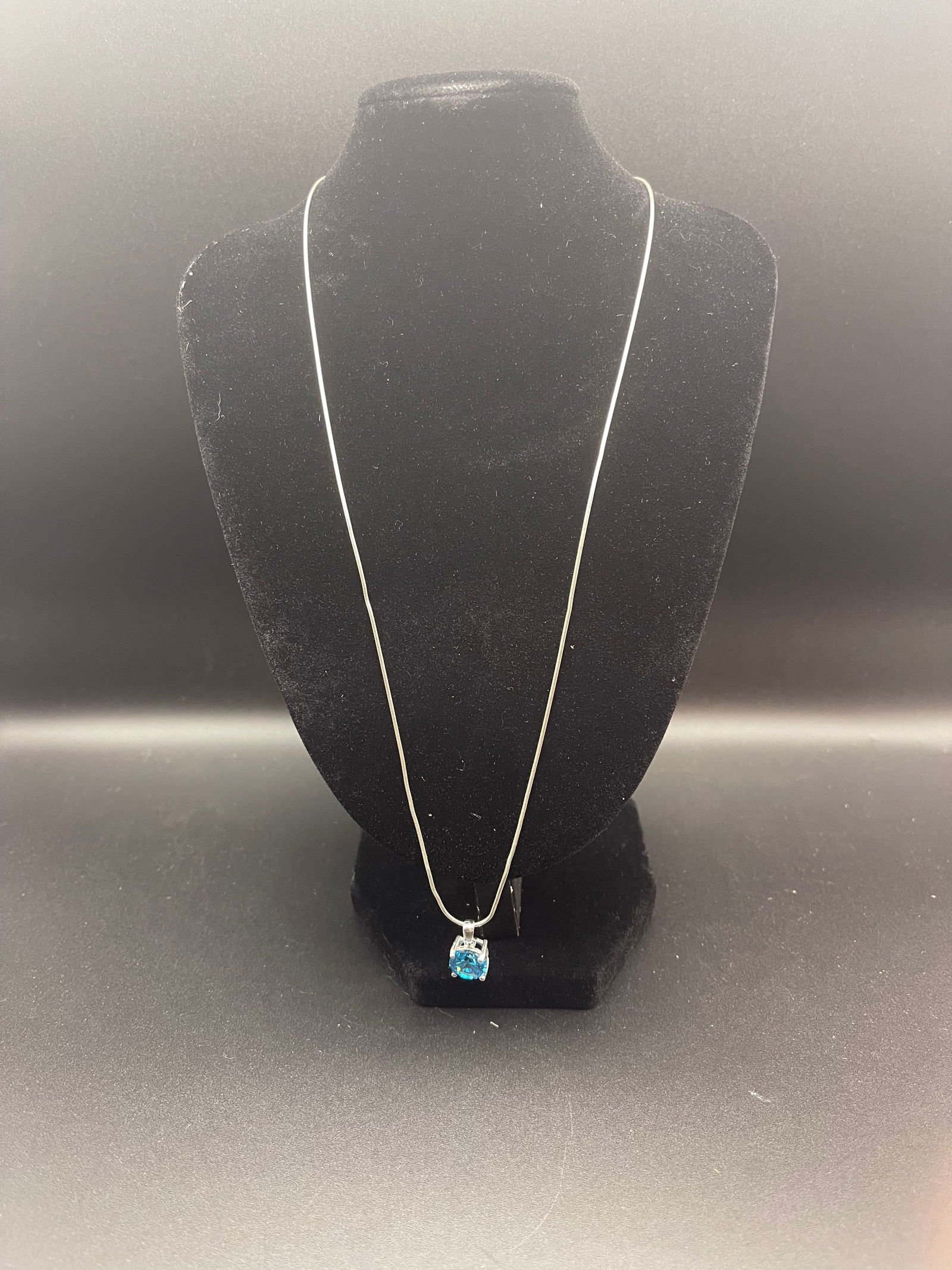 Sterling Silver Blue Topaz Pendant on 20' Sterling Silver Chain: Sterling Silver Blue Topaz Pendant on 20" Sterling Silver Chain Condition Yes, we will ship this item, we provide in house shipping to save our customers money. S&H fees and insurance will be added to