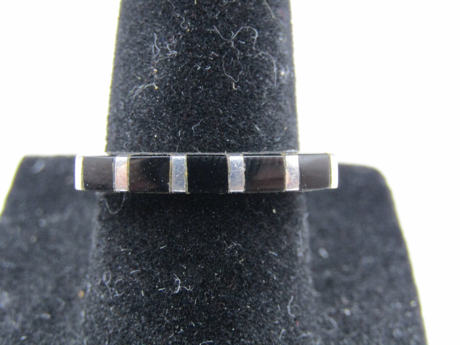 Size 6.75 Sterling Silver Ring with Black Stones: Size 6.75 Sterling Silver Ring with Black Stones Condition Yes, we will ship this item, we provide in house shipping to save our customers money. S&H fees and insurance will be added to your invoice. 