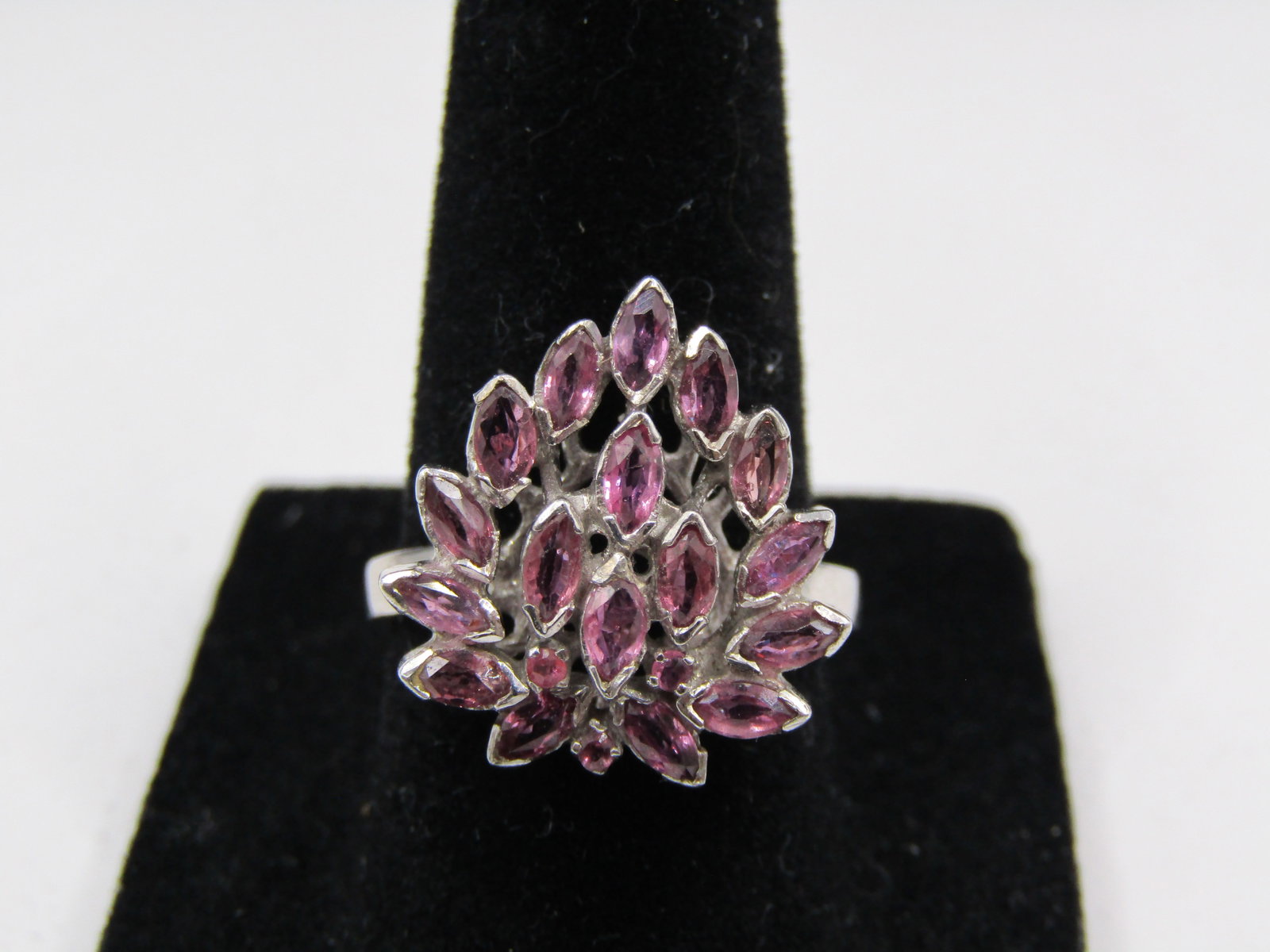 Size 7 Sterling Silver Ring with Purple Leaf Shaped Gemstones: Size 7 Sterling Silver Ring with Purple Leaf Shaped Gemstones Condition Yes, we will ship this item, we provide in house shipping to save our customers money. S&H fees and insurance will be added to y