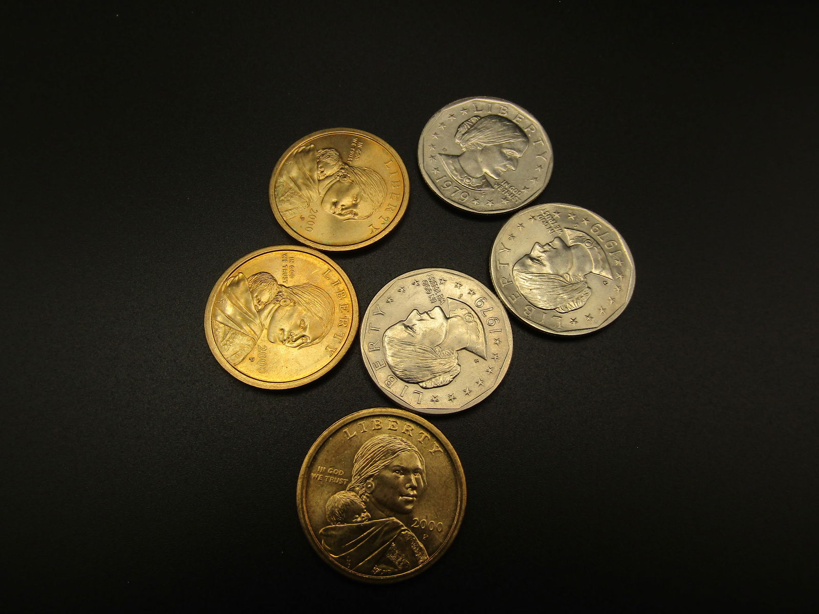 3-1979 Susan B Anthony Dollars and 3- 2000 Sacagawea Golden Dollars. UNC. First Year Issues for (1 of 4)