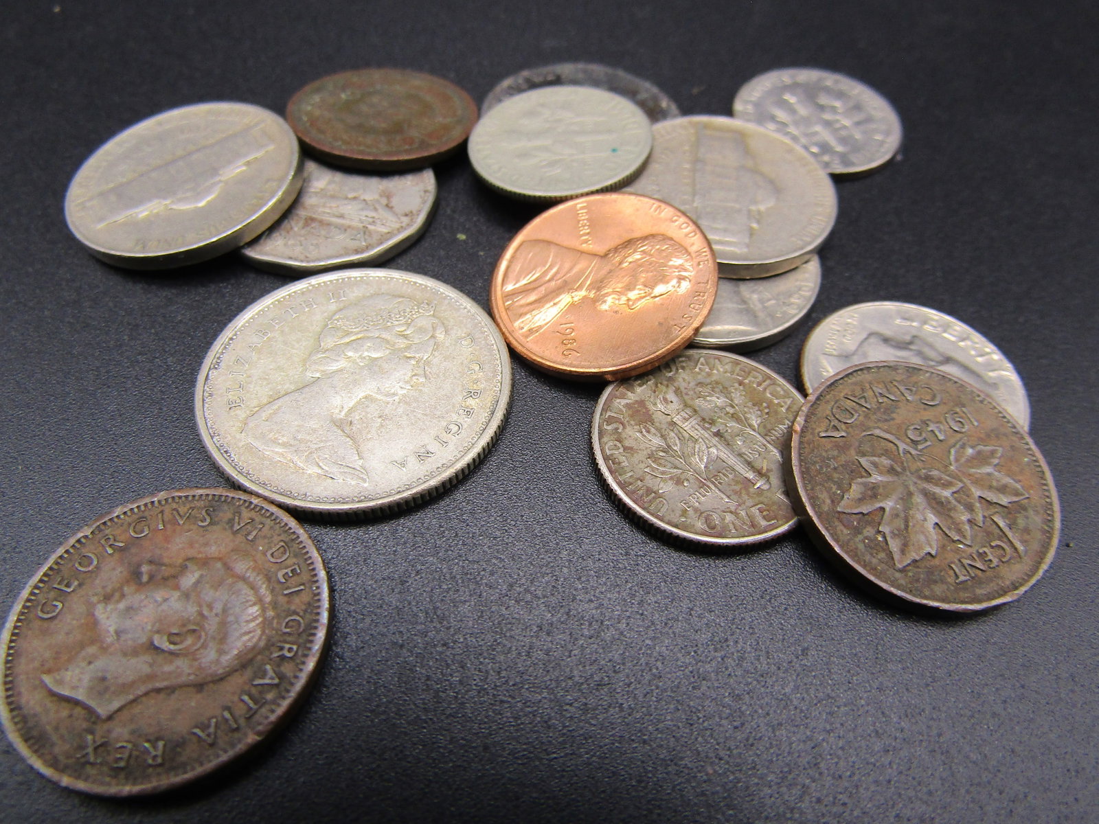 14 Mixed Coins; Indian Head Cent, US and Canada Coins: 14 Mixed Coins; Indian Head Cent, US and Canada Coins Condition Yes, we will ship this item, we provide in house shipping to save our customers money. S&H fees and insurance will be added to your invo