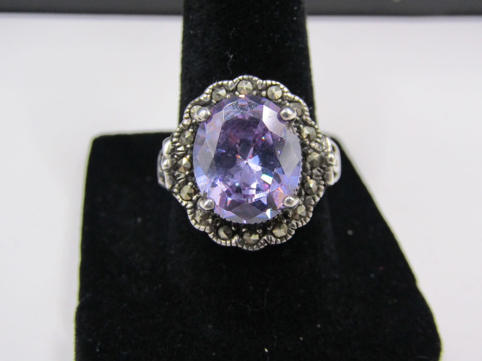 Size 7.75 Sterling Silver Amethyst and Marcasite Scalloped Ring, Lab Created Gems.: Size 7.75 Sterling Silver Amethyst and Marcasite Scalloped Ring, Lab Created Gems. Condition Yes, we will ship this item, we provide in house shipping to save our customers money. S&H fees and insuran