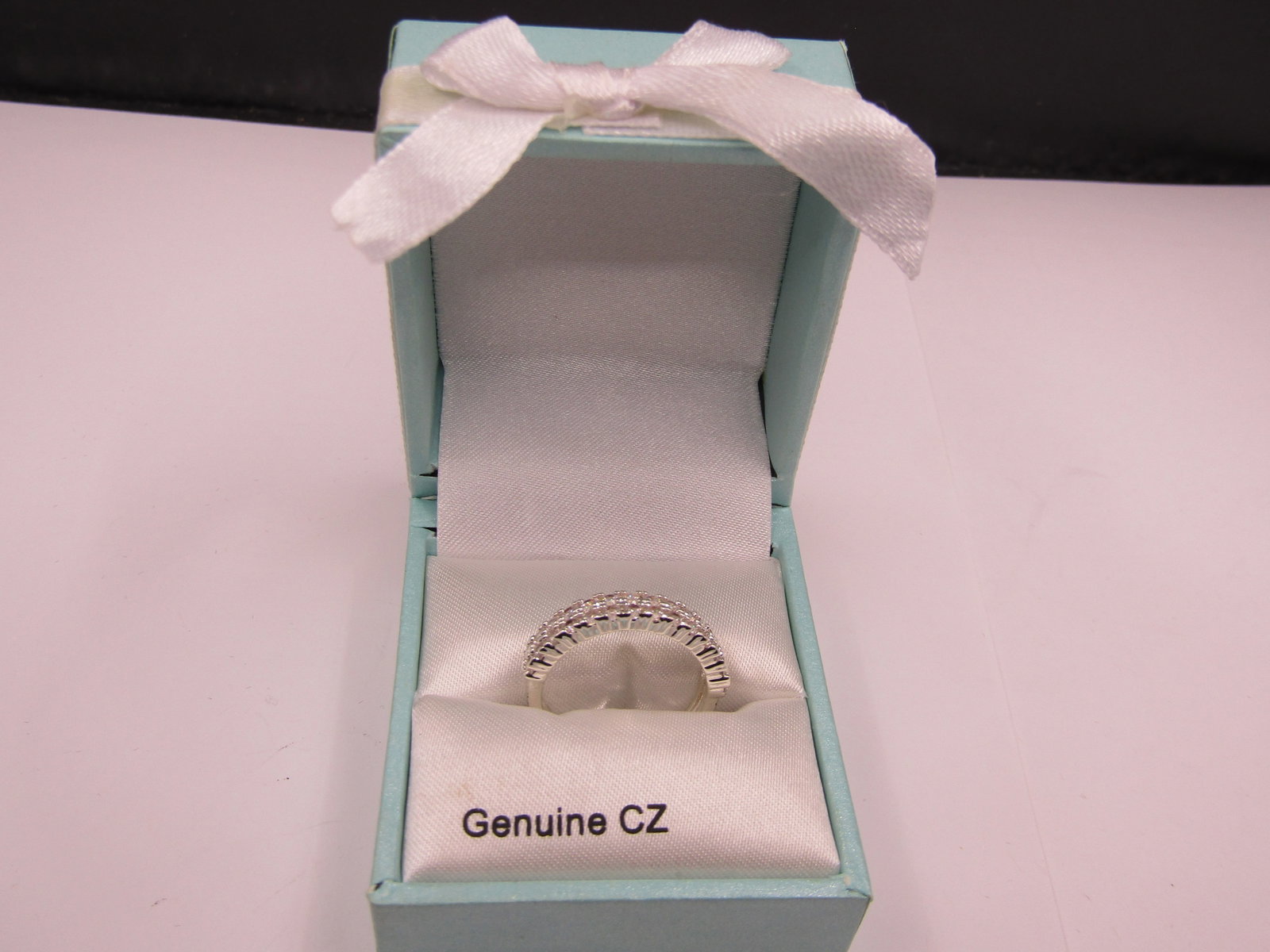 Sterling Silver Size 7 Genuine CZ Ring. NEW: Sterling Silver Size 7 Genuine CZ Ring. NEW Condition Yes, we will ship this item, we provide in house shipping to save our customers money. S&H fees and insurance will be added to your invoice. If yo