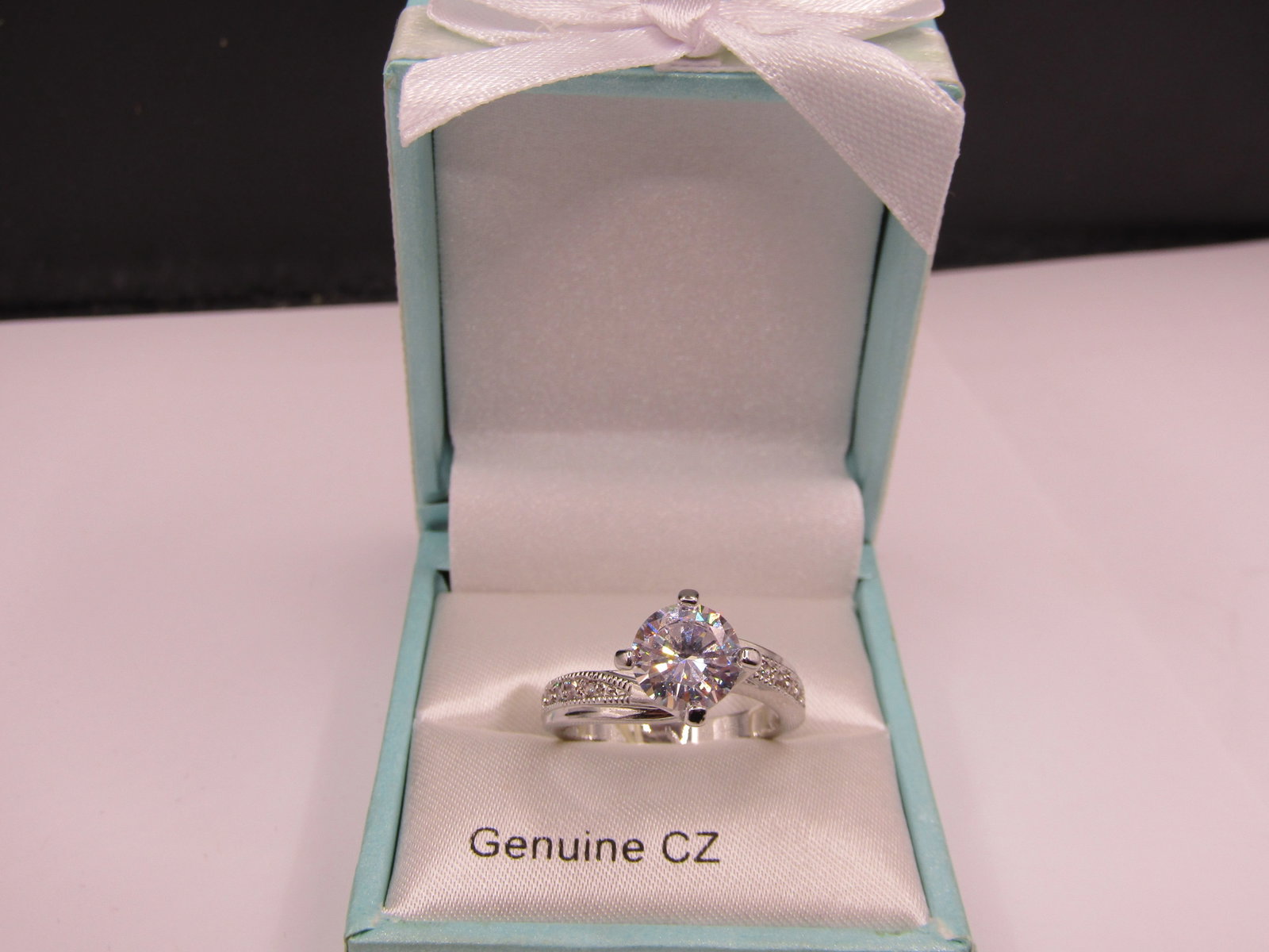 Sterling Silver Size 7 Genuine CZ Ring. NEW: Sterling Silver Size 7 Genuine CZ Ring. NEW Condition Yes, we will ship this item, we provide in house shipping to save our customers money. S&H fees and insurance will be added to your invoice. If yo