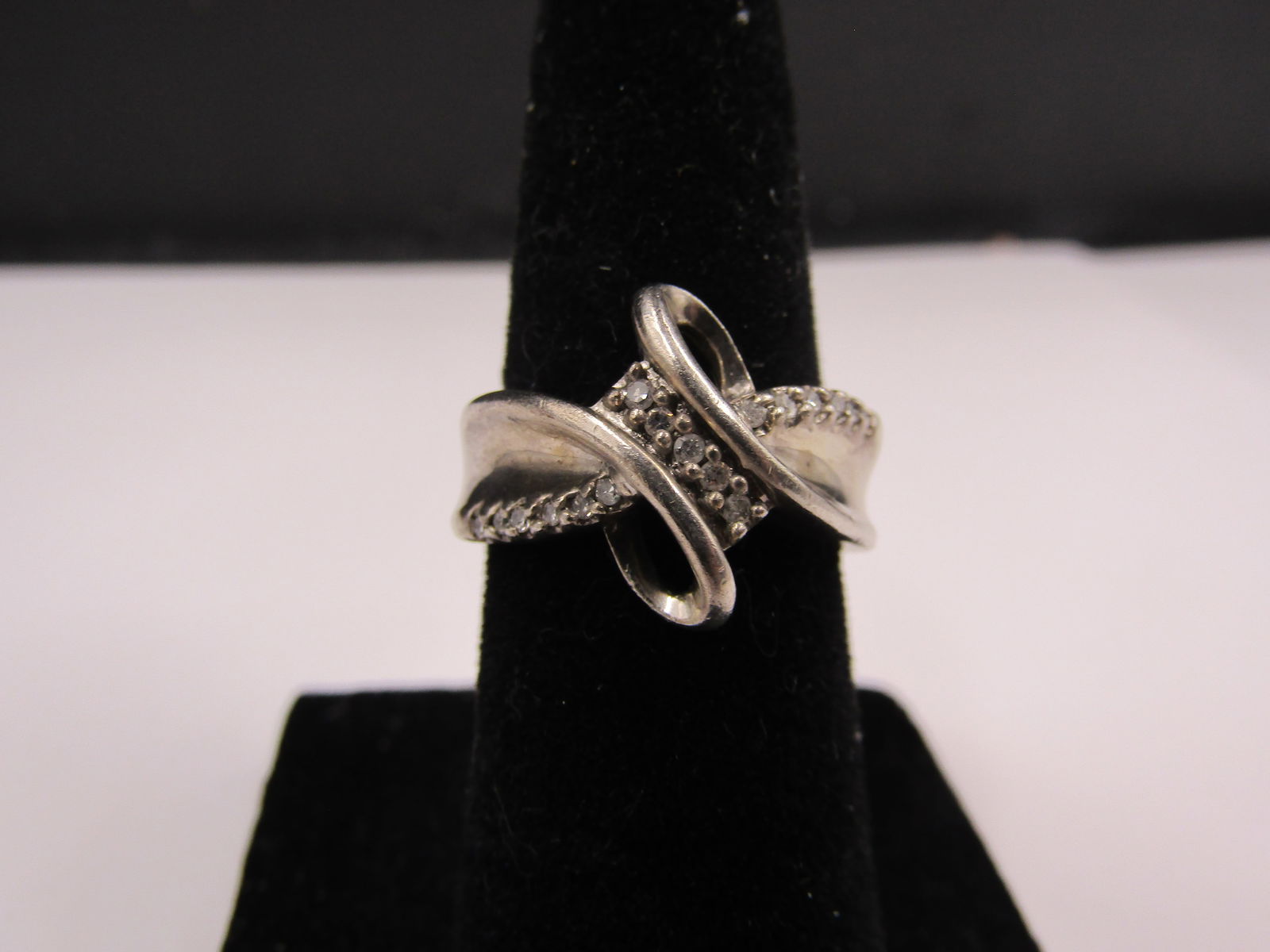 Sterling Silver Size 4 Vintage Diamond Accent Designer Ring: Sterling Silver Size 4 Vintage Diamond Accent Designer Ring Condition Yes, we will ship this item, we provide in house shipping to save our customers money. S&H fees and insurance will be added to you