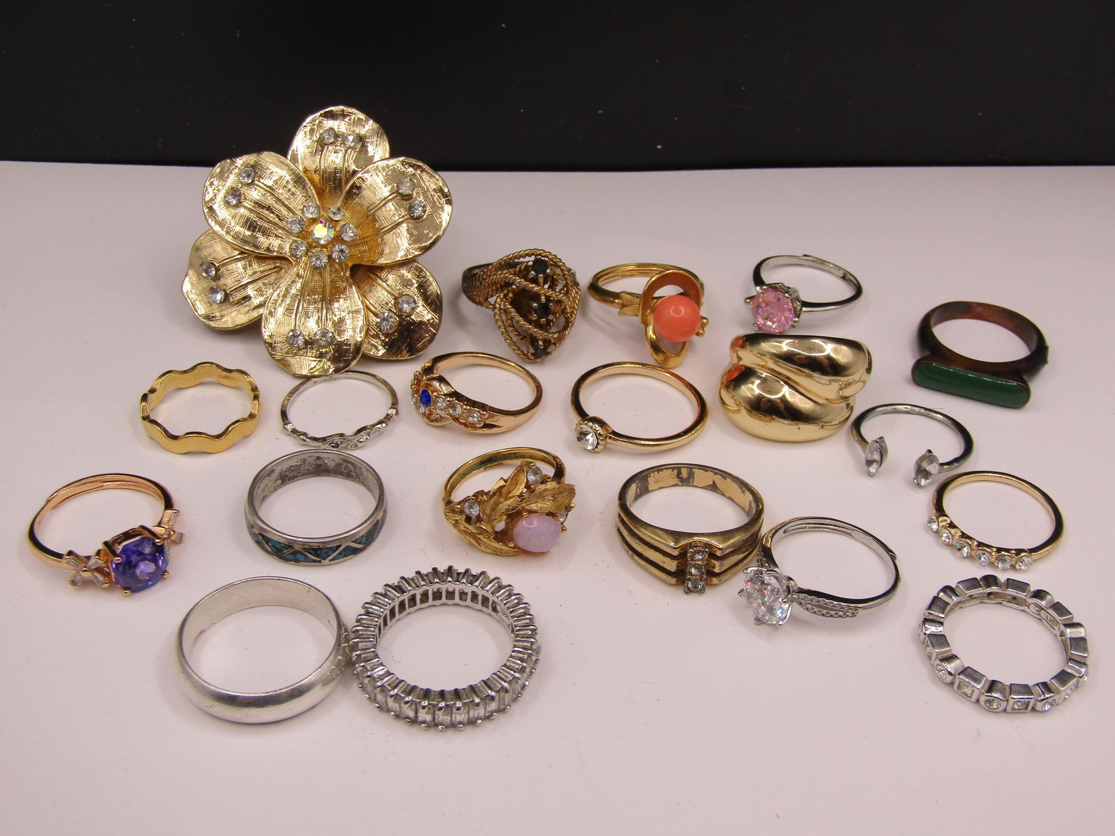 20 Rings, Some Marked Sterling Silver, Various Styles and Sizes, Several Adjustable.: 20 Rings, Some Marked Sterling Silver, Various Styles and Sizes, Several Adjustable. Condition Yes, we will ship this item, we provide in house shipping to save our customers money. S&H fees and insur