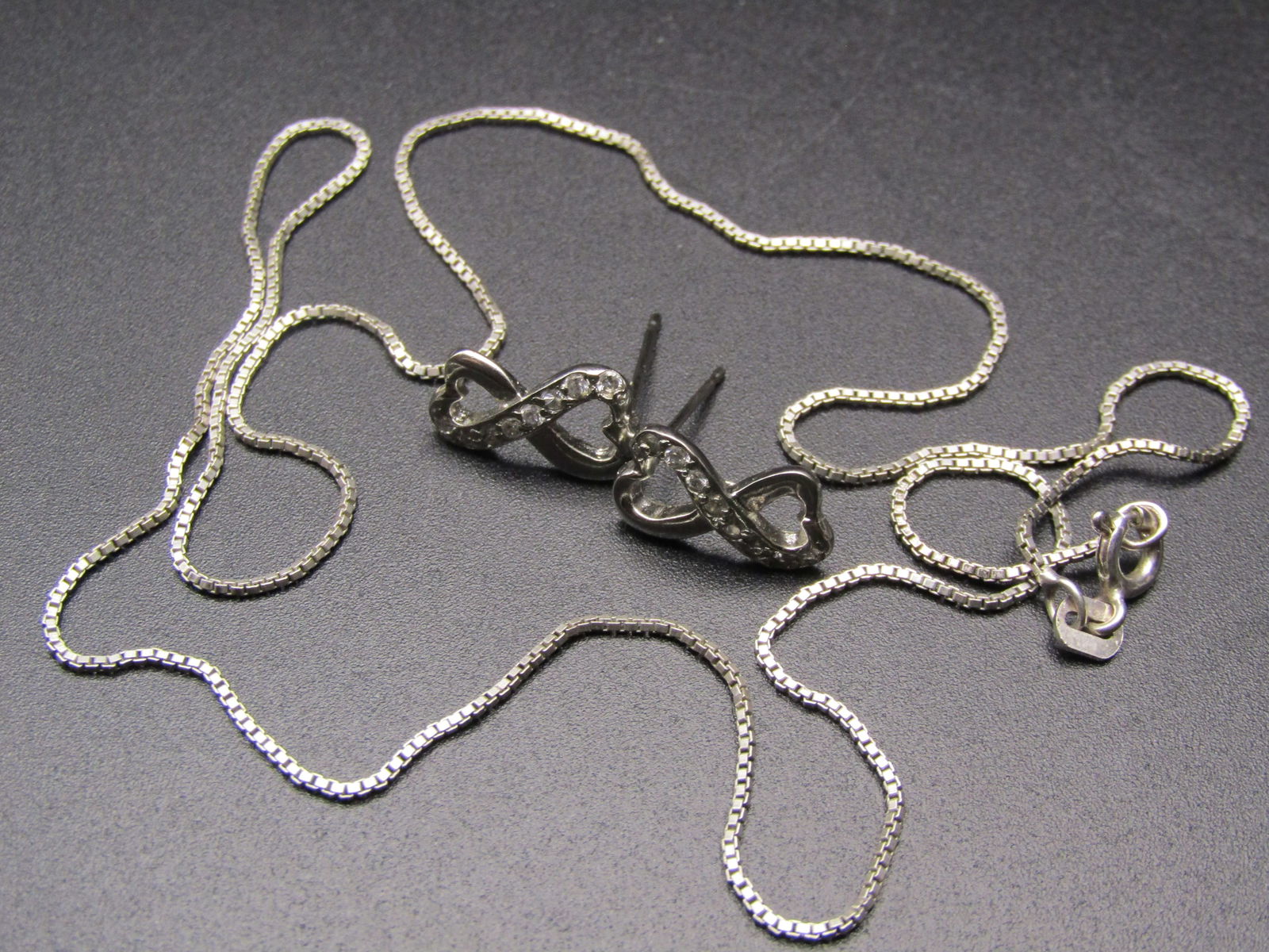 Pair Of Inner Locked Sterling Silver and Jeweled Earrings and 18' Sterling Silver Chain Marked Italy: Pair Of Inner Locked Sterling Silver and Jeweled Earrings and 18" Sterling Silver Chain Marked Italy Condition Yes, we will ship this item, we provide in house shipping to save our customers money. S&