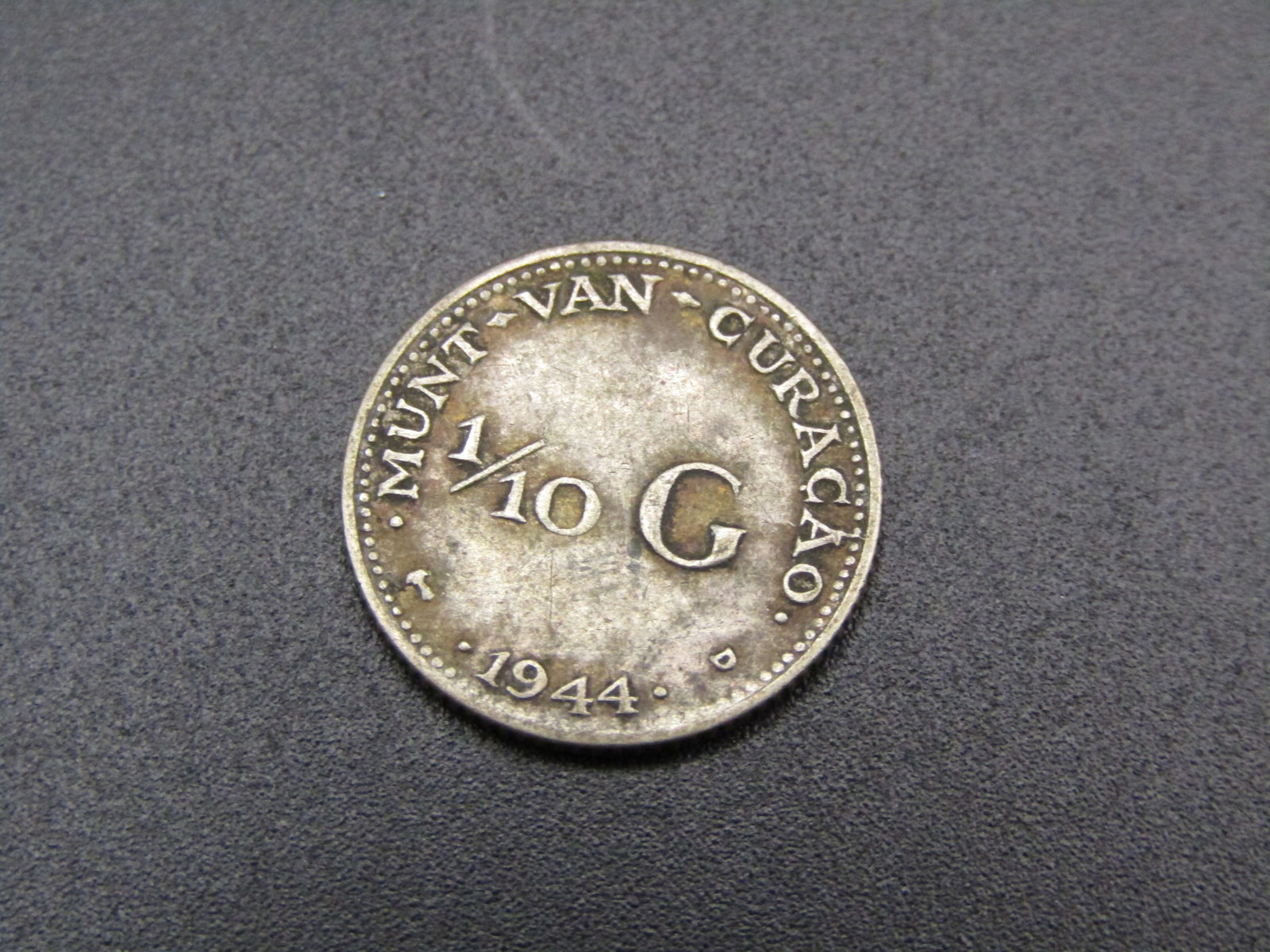 1944D Netherlands Silver 1/10 Gulden: 1944D Netherlands Silver 1/10 Gulden Condition Yes, we will ship this item, we provide in house shipping to save our customers money. S&H fees and insurance will be added to your invoice. If you would