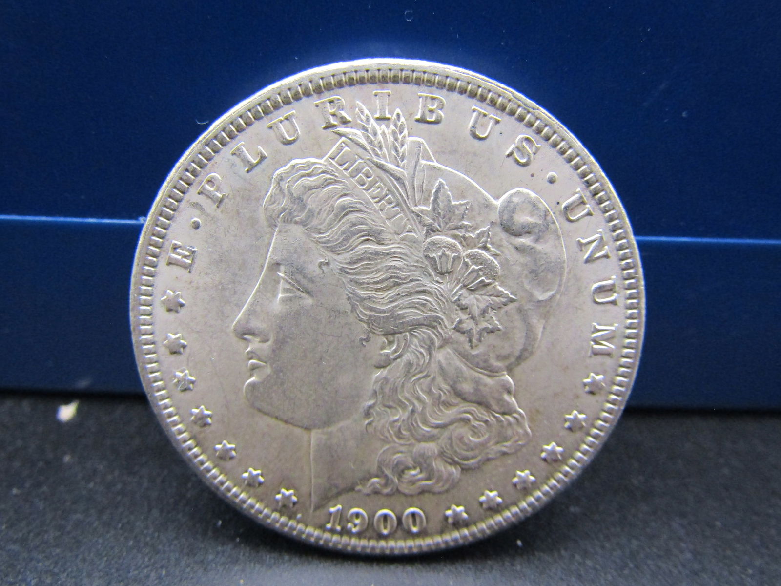 1900 Morgan Silver Dollar. 90% Silver, Nice Grade: 1900 Morgan Silver Dollar. 90% Silver, Nice Grade