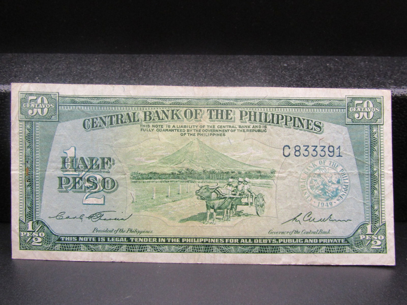 1949 Philippines 1/2 Peso Bank Note, tough; Printed to Replace Metallic Coins of the Same Value (1 of 2)