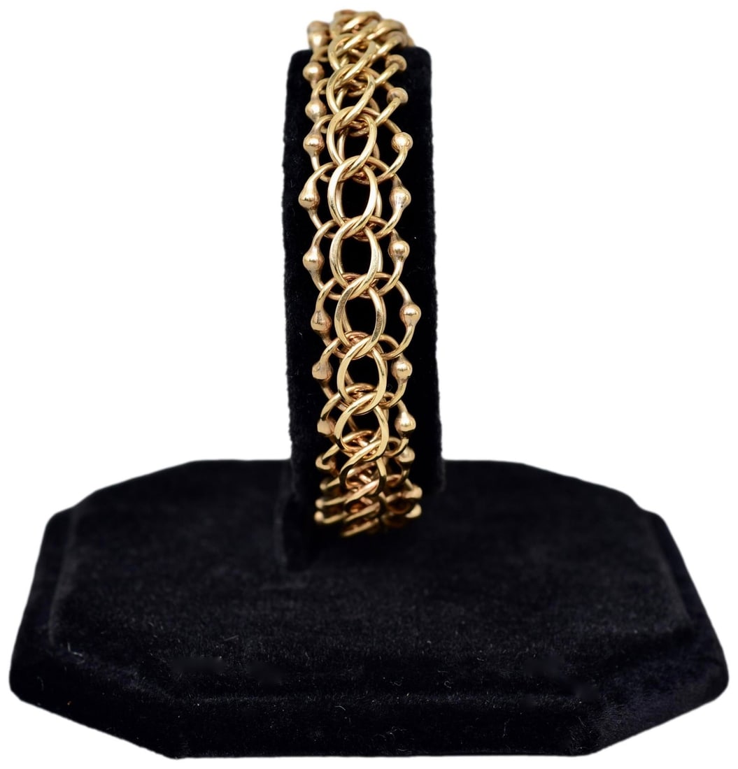 14K Yellow Gold Circular Bracelet: Length: 8” Weight: 14.4 pennyweights Stamped: 14K The Arts Auction House also offers local delivery to Manhattan, Connecticut and Westchester for most items excluding large furniture. For a pric
