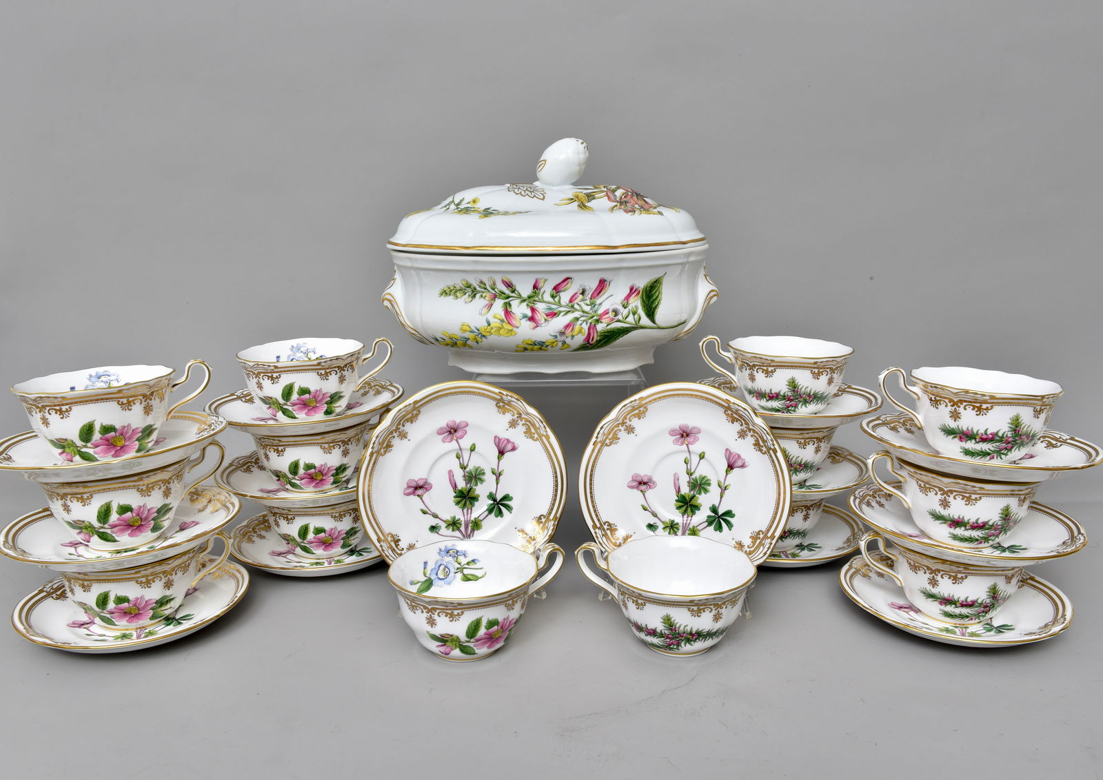 Set of 14 Spode Stafford Flowers Cups, Saucers and Covered Tureen: Spode Stafford Flowers Oxalis Saucers Y8519-P Spode Stafford Flowers Thumberia Camellia Polygala Y8519-P Dimensions: Cups: 4 7/8”Diam. x 2 1/4”H Saucers: 6 1/8”Diam. Tureen: 11 1/2&r
