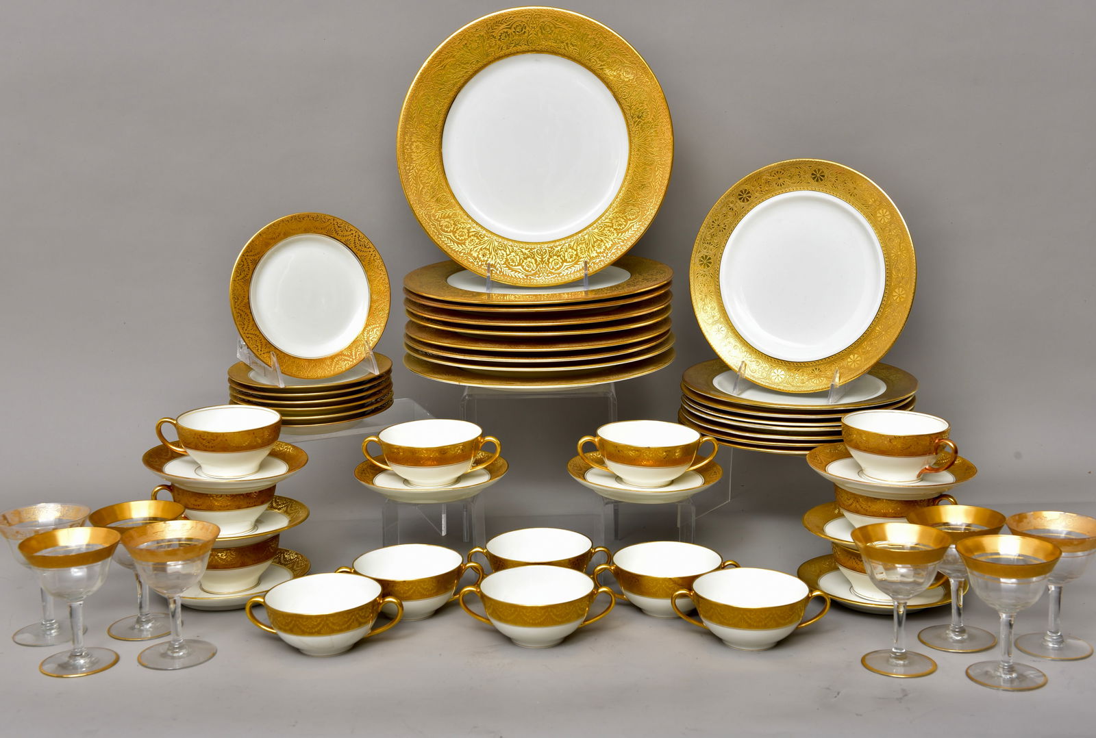 Elite Limoges France Elite Works Gilded Dinnerware: Set includes: Set of 9 dinner plates: 10 1/2” Set of 8 lunch/salad plates: 8 3/4” Set of 7 bread & butter plates: 6 1/8” Set of 8 bouillon cups: 5”Diam. x 2”H Set of 8 sh
