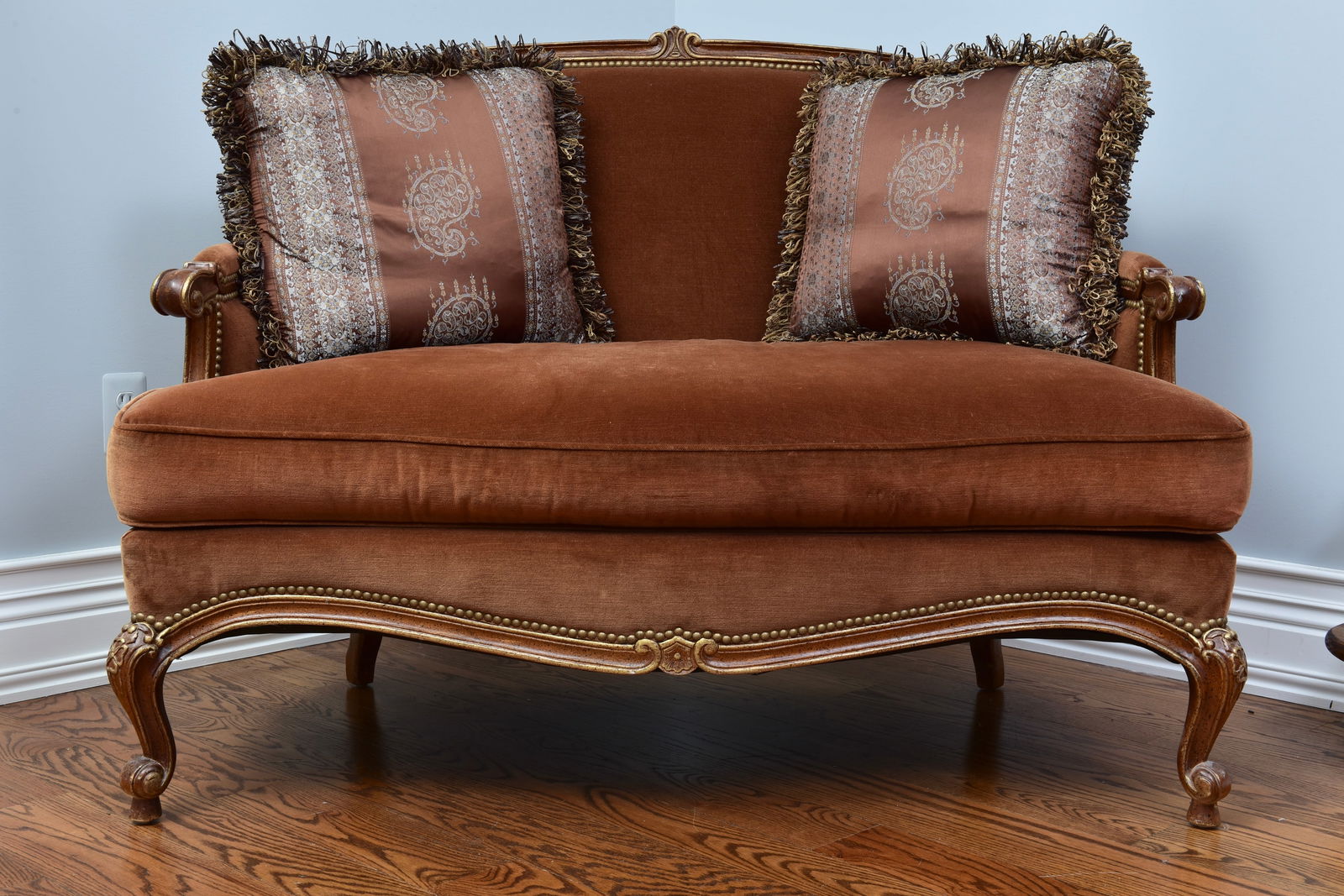 Wesley Hall Velvet Settee: Includes two throw pillows as shown. Dimensions: 52”W x 32” x 34 1/2”H - Floor to seat: 19”H The Arts Auction House offers local delivery to Manhattan, Connecticut and Westches