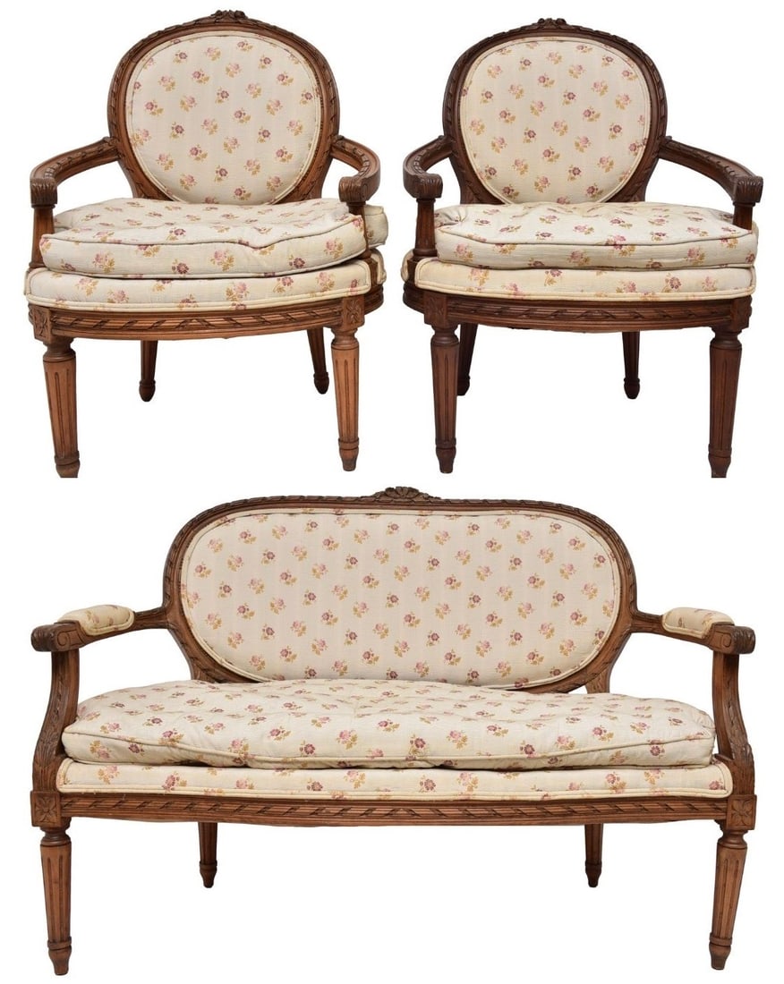 French Carved Walnut 19th Century Louis XVI Settee and Chairs: Dimensions: Settee: 46 1/2”W x 22”D x 35”H - Floor to seat: 17”H Chairs: 24”W x 19”D x 33”H - Floor to seat: 17”H French antique carved walnut settee wi