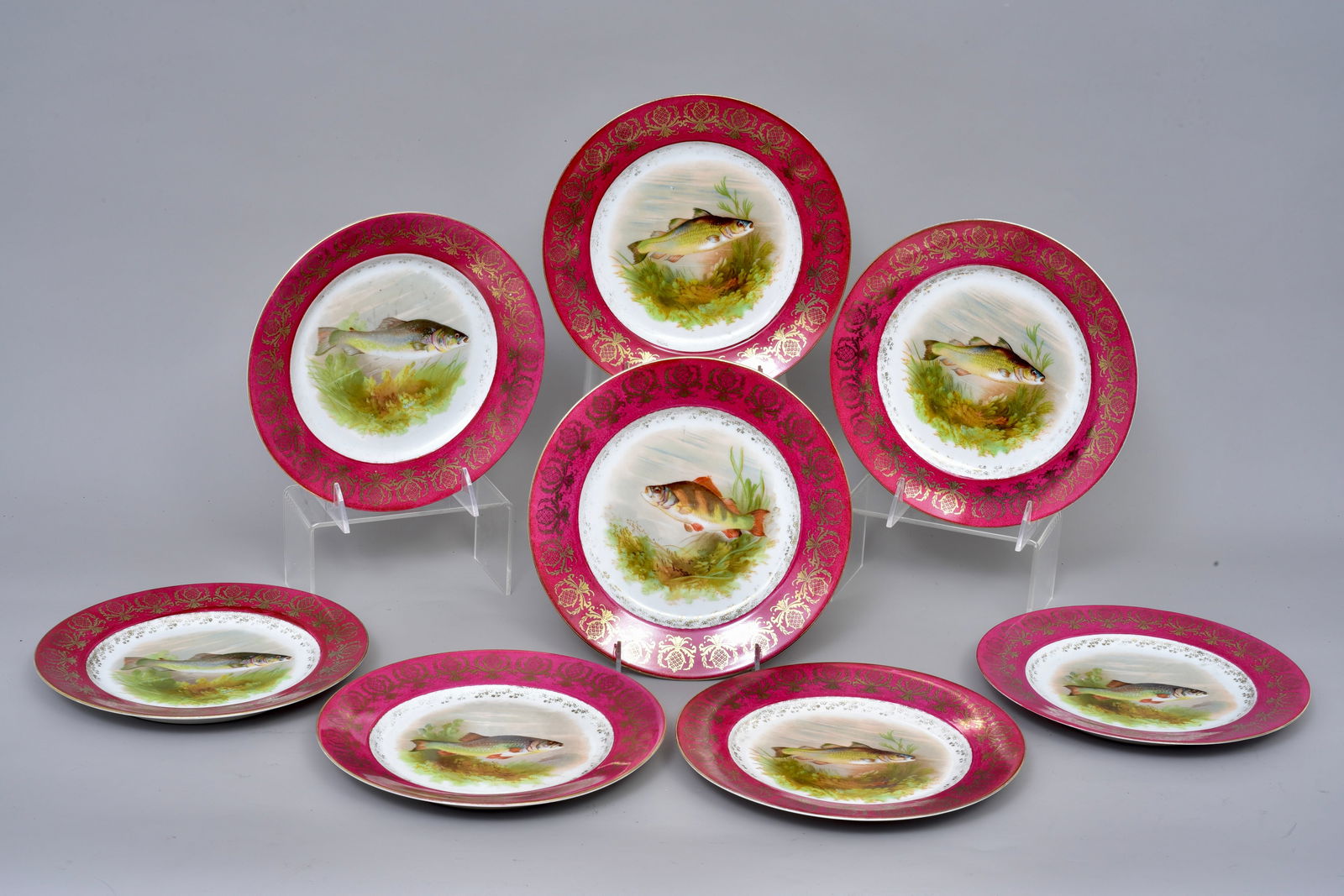 Set of Seven M&Z Austria Fish Plates: Dimensions: 8 1/2”Diam. The Arts Auction House offers local delivery to Manhattan, Connecticut and Westchester for most items excluding very large furniture. For a price quote on delivery, pleas