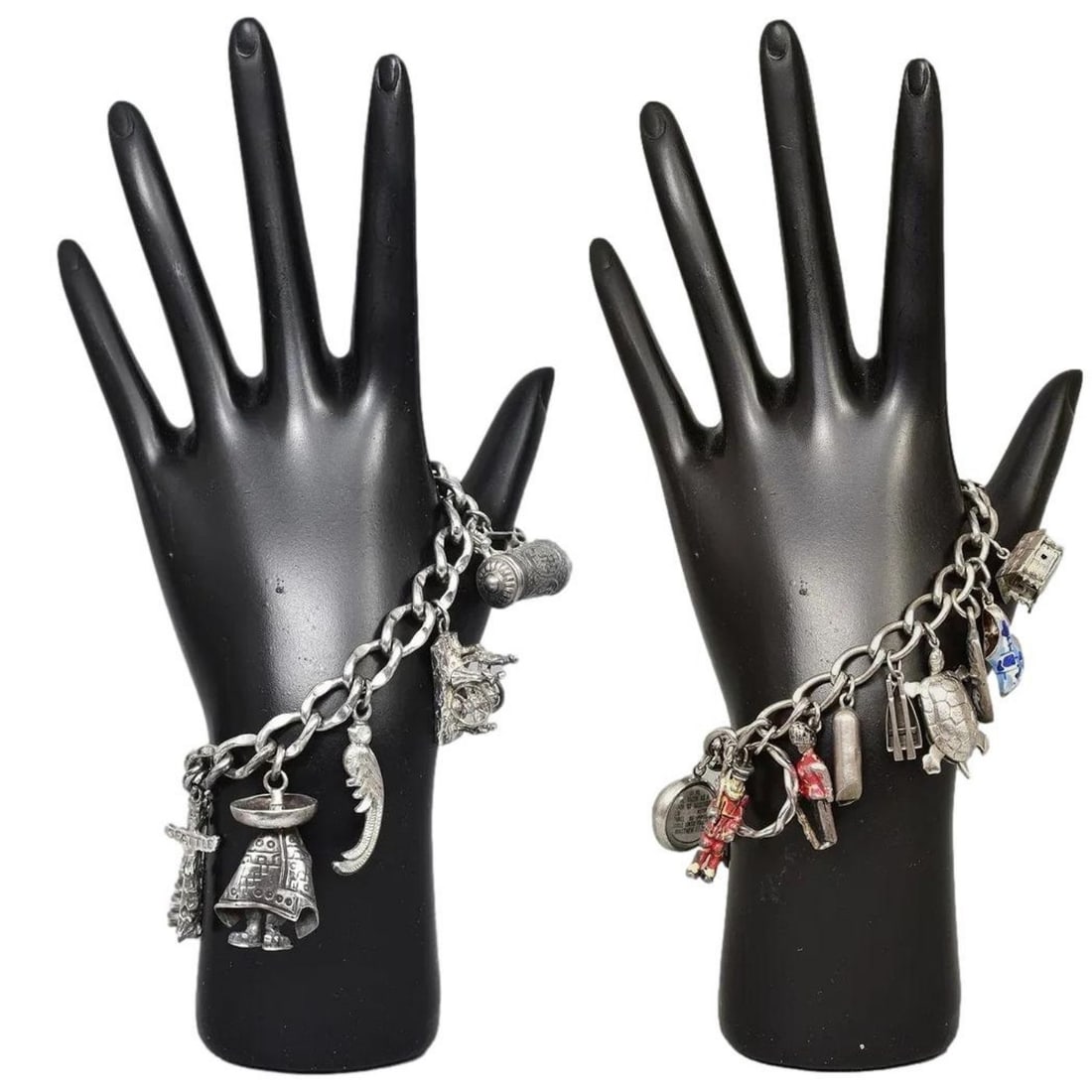 Pair of Sterling Silver Charm Bracelets: Sterling silver vintage 16 charm bracelet with a ton of charms including a telephone, turtle, painted soldiers, motorcycle, fleur-de-lis, sailboat and much more! Weight: 39.2 grams Dimensions: 6 1/2"