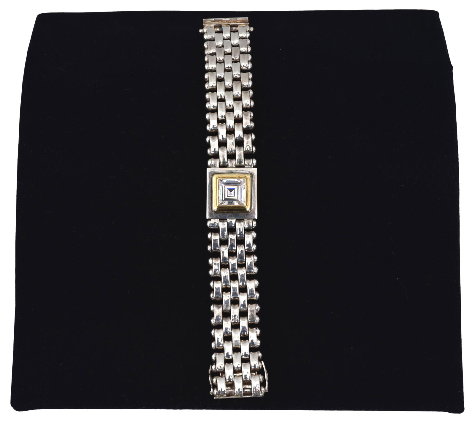 Sterling Silver and 18K Gold Panther Link Bracelet: Weight: 66.45 grams (gross) Length: 7 1/4” Stamped: 750 / 925 / hallmark The Arts Auction House offers local delivery to Manhattan, Connecticut and Westchester for most items excluding very larg