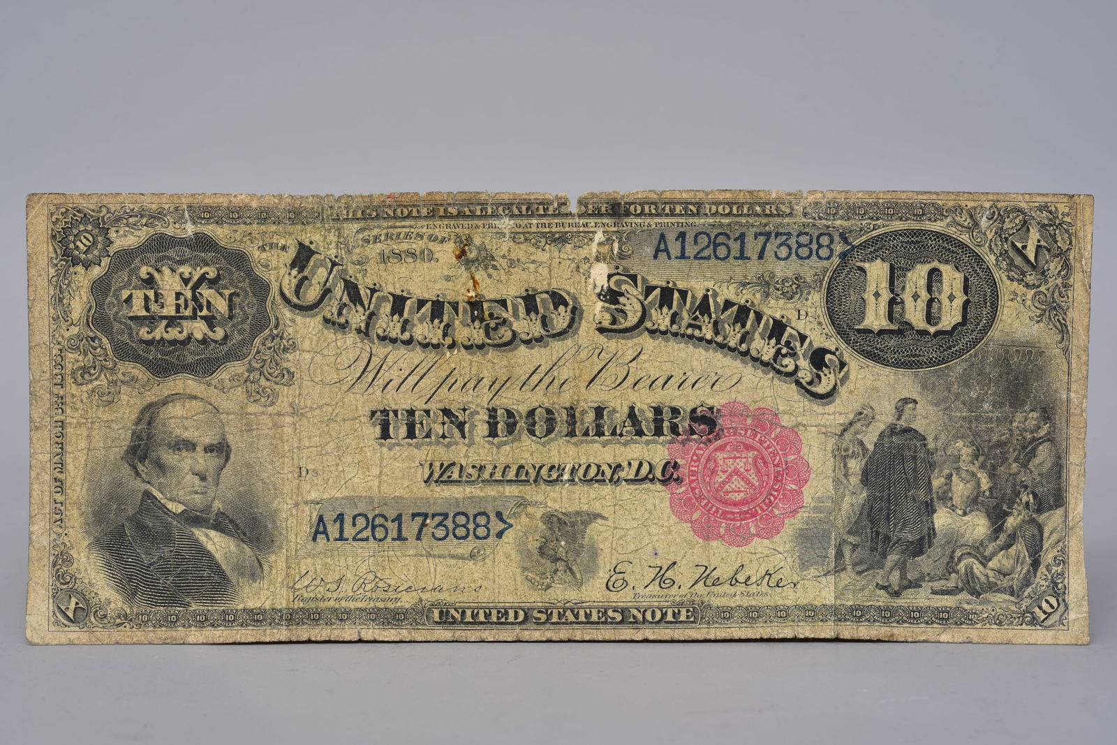 1907 $10 U.S. Legal Tender Note – Daniel Webster Portrait: Original United States $10 Legal Tender Note, Series of 1907, featuring the portrait of Daniel Webster at left and the allegorical vignette “Agriculture and Mechanics” at right. Red Treasury s