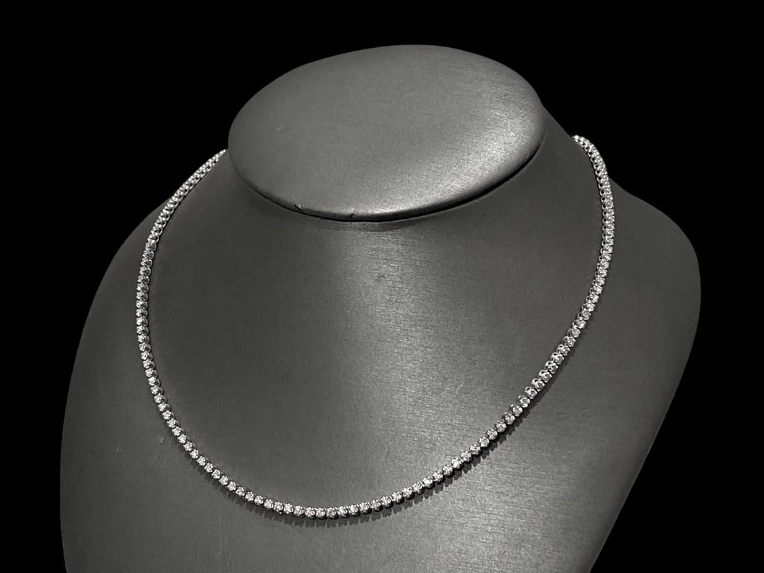 Apprx 5.0 Carats LAB Created Diamond Tennis Necklace VS1-VS2/F-G in 10K W Gold: Diamonds: Approx 5 TCW. (each stone measures 2.0mm which is 0.035ct) Diamond count: 153 LAB Created Round Brilliant-cut stones Diamond Color: F-G Diamond Clarity: VS1-VS2 Metal: 10K White Gold, Prong,