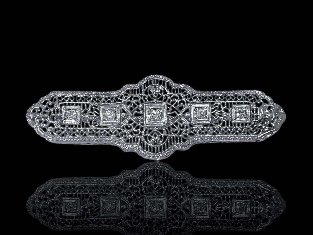 Art-Deco 14K White Gold & Platinum Filigree Pin Brooch With 5 Natural Diamonds: Item: Pin Brooch Metal: 14K White gold & Platinum Stones: Diamonds: 5 round cut stones 2.5 mm each. Clarity & Color: VS1 G Brooch dimensions: 2" Long, x 0.75" Widest point Total weight: 4.3 grams Cond