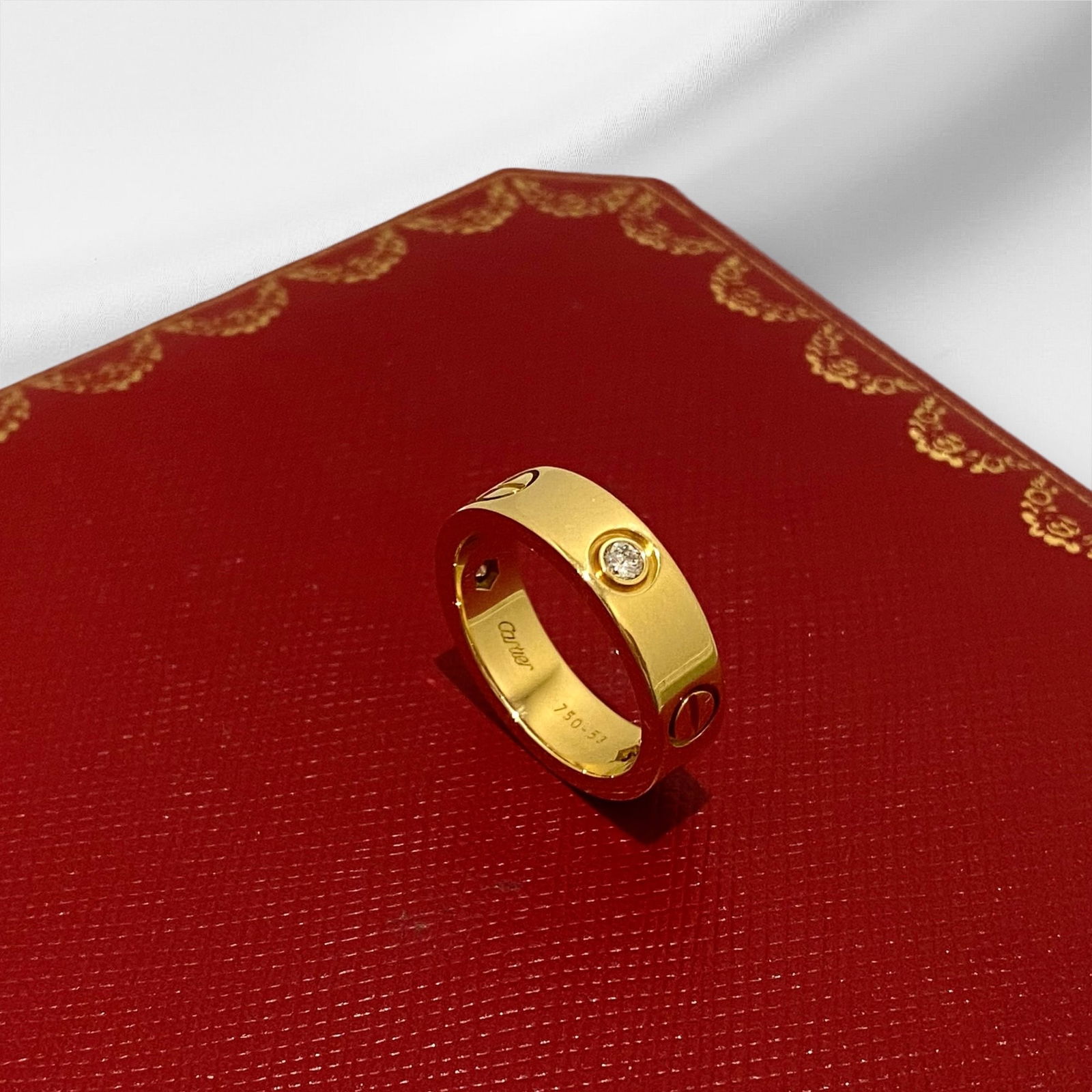 Cartier Love Wedding Band, 3 Diamond, 18k Yellow Gold, Size 53: Condition: Like new Brand: Cartier Metal: 18k Yellow gold Gemstone: Diamond, 3 brilliant-cut diamonds totaling 0.22 carats Ring size: 53 Weight: 9 Grams Comes in Original Box or Pouch