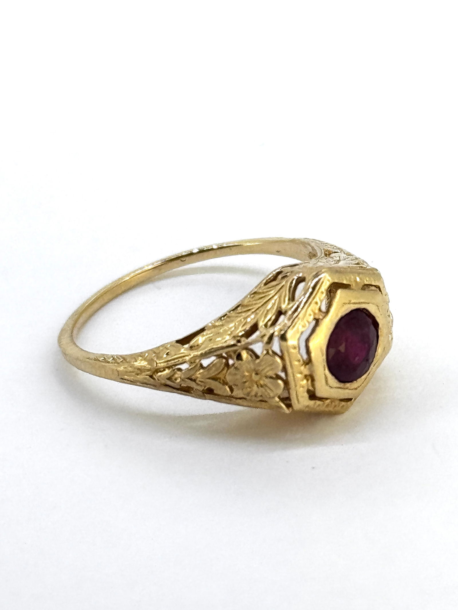 Natural Ruby Vintage Style Filigree Ring in 14k Yellow Gold: Condition: Like New. Brand: Unbranded. Material: 14k Yellow Gold. Gemstone: Round-cut Ruby Diamond Count: 1. Ring Size: 6.25. Weight: 2.6 grams.
