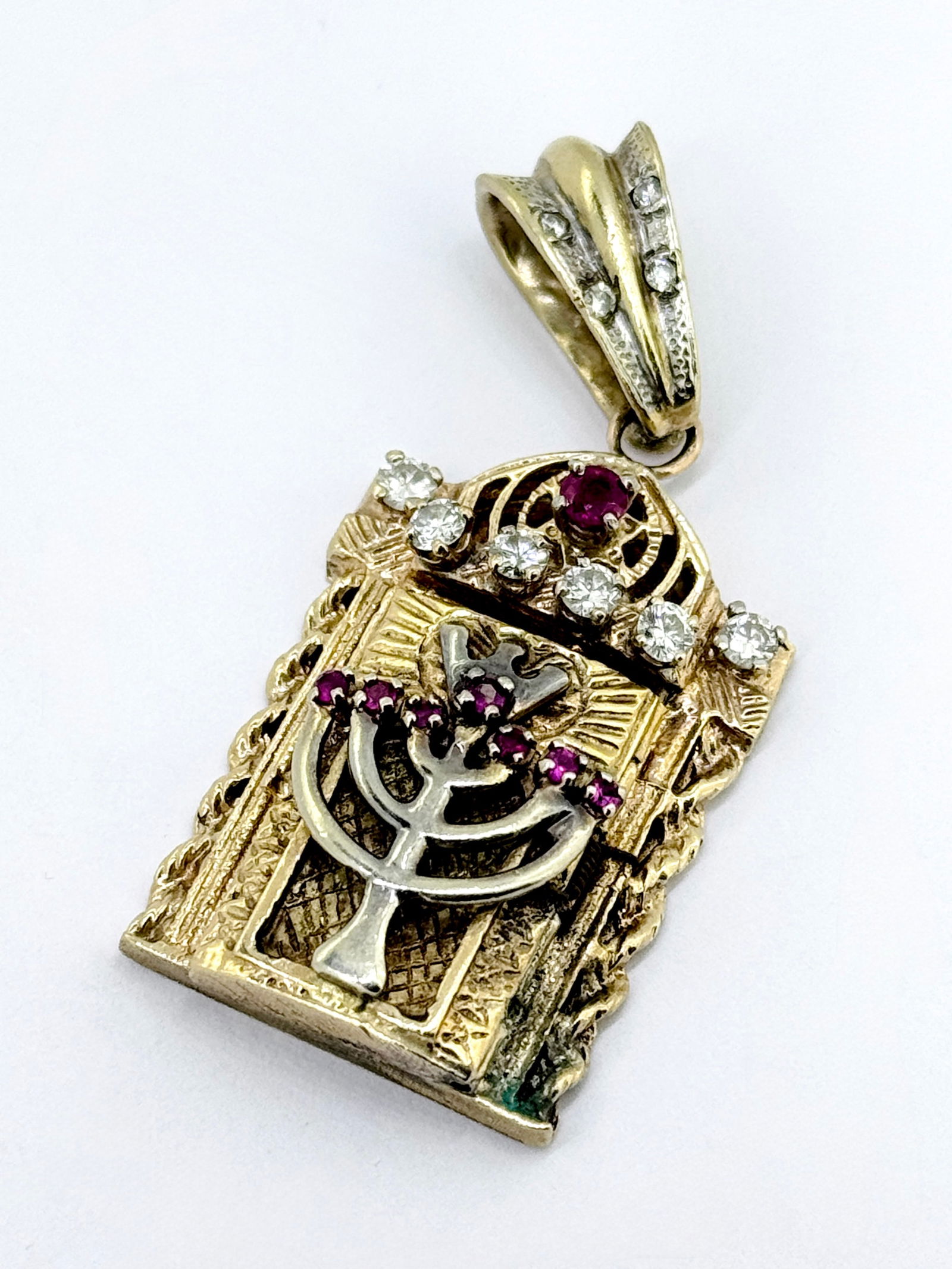 14k Yellow Gold Diamond and Ruby Torah Scroll Design Vintage Pendant: Condition: Like New Brand: Unbranded. Metal Purity: 14k Yellow Gold. Gemstone: Round Diamond and Ruby. Diamond Count: 10 Round Diamonds. Ruby Count: 8. Diamond Carat Weight: APX 1 Carat. Clarity & Col