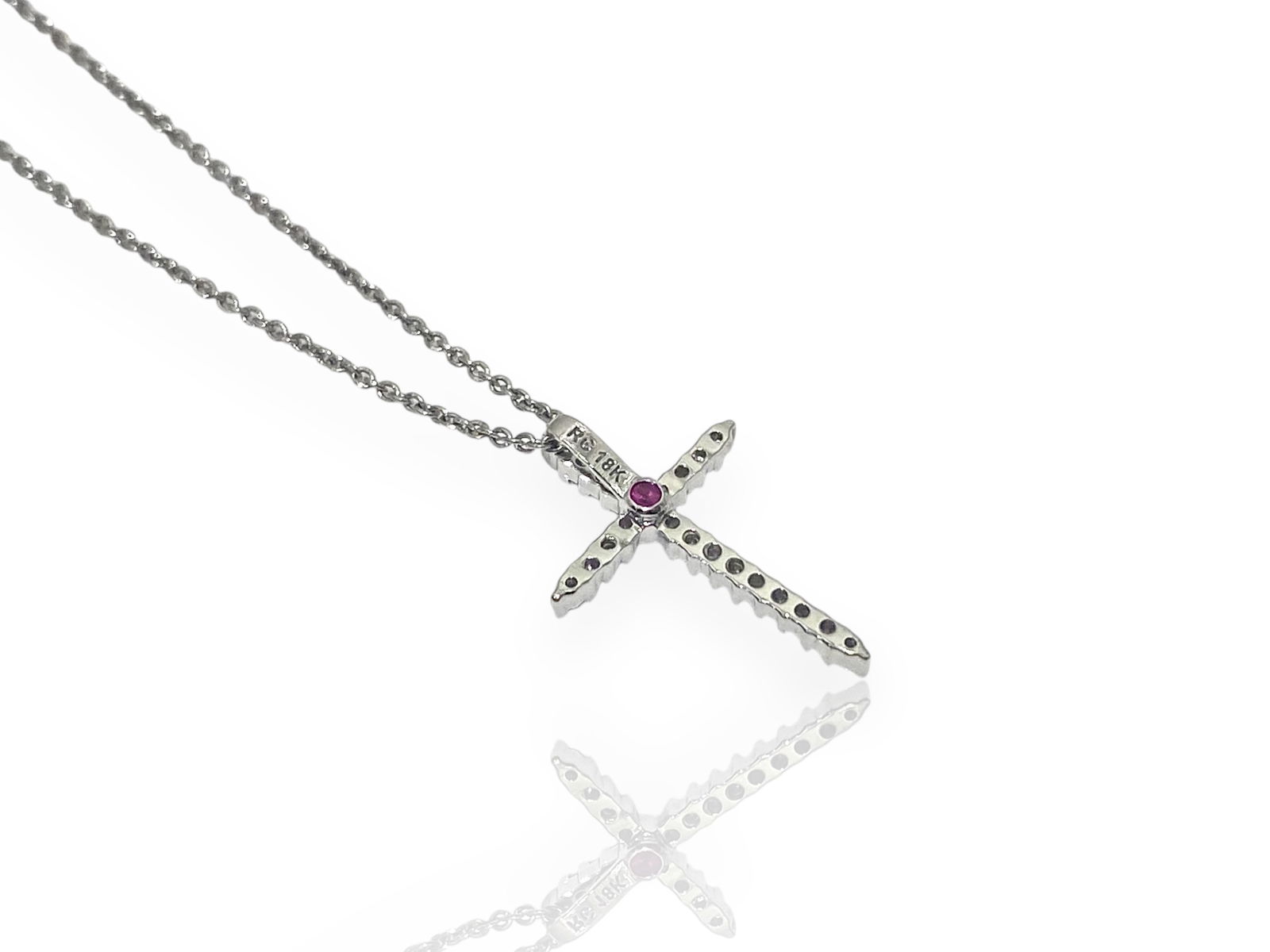 Roberto Coin 18K White Gold and Diamond Cross Pendant Necklace: Condition: Like New Brand: Roberto Coin Material: 18k White Gold Jewel: Round Brilliant Cut Diamonds Pendant Dimensions: 0.7" x 0.5" Chain: adjustable 16-18"L Weight: 2.3 grams.