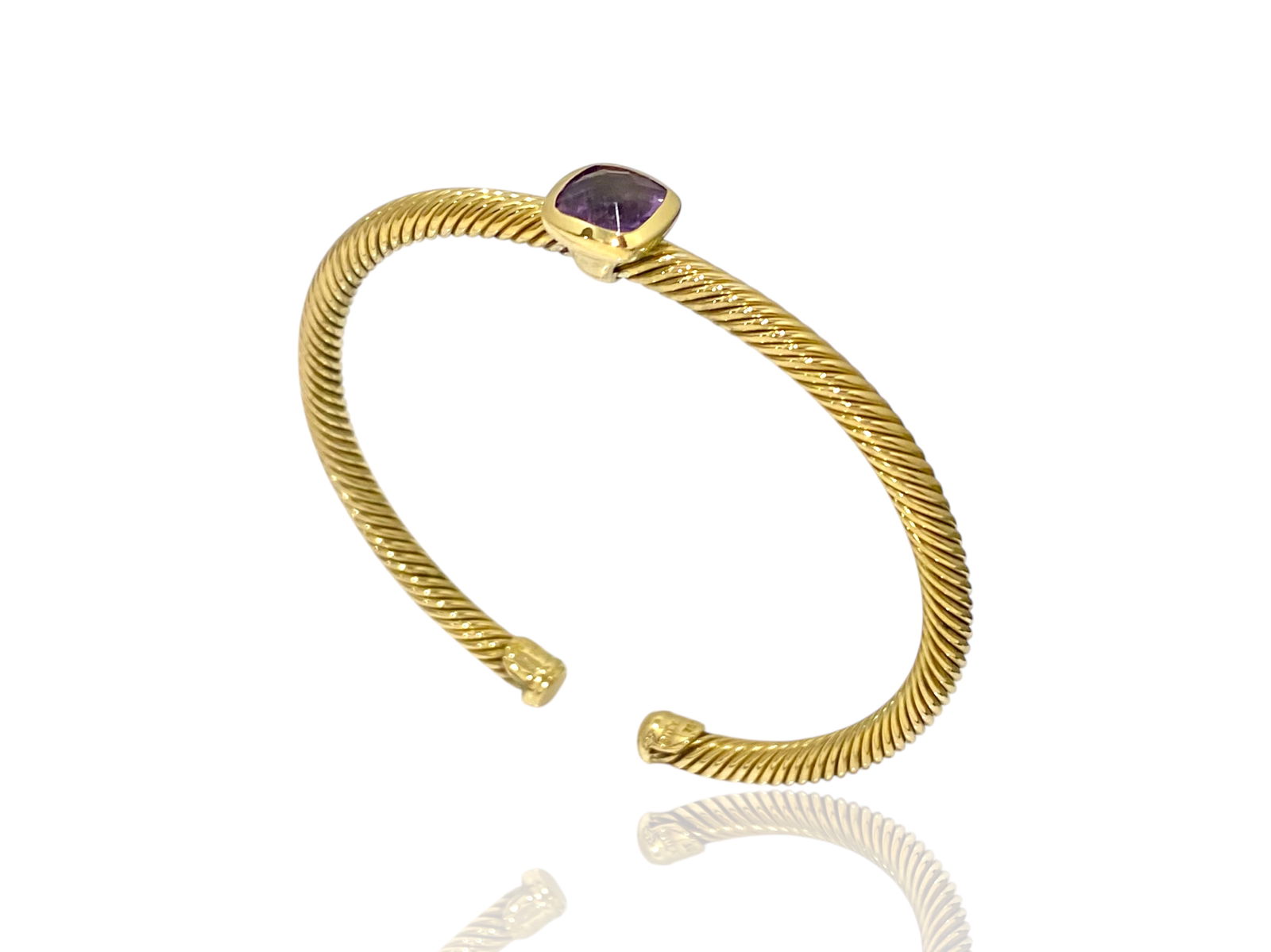 David Yurman 18K Yellow Gold Amethyst 4mm Classic Cable Cuff Bracelet: Condition: Like New. Brand: David Yurman. Material: 18K Yellow Gold. GemStone: Amethyst, 9mm. Bracelet Width: 4 mm. Weight: 21.4 grams.