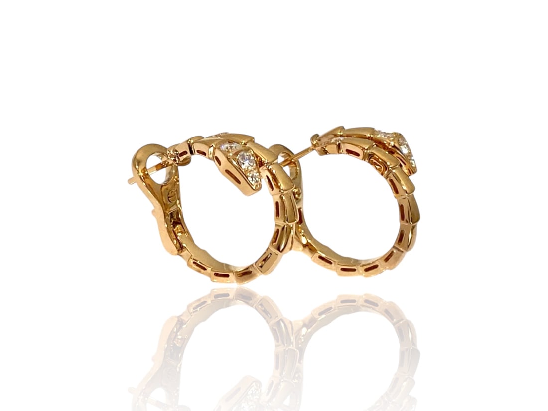 BVLGARI Serpenti Viper earrings in 18kt rose gold set with Demi Pave Diamonds: Condition: Like New Brand: BVLGARI Material: 18k Rose Gold Diamonds (Carats):0.18 Diamond Count: 10 Made In: Italy