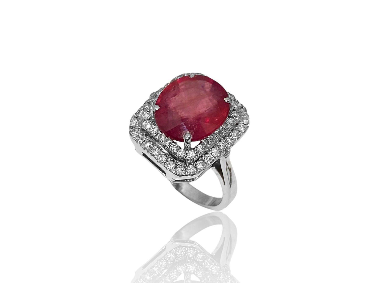 18k White Gold Ruby and Diamond Paved Halo Cocktail Ring: Condition: Like New Brand: Unbranded. Metal: 18k White Gold. GemStone: Glass Diamond Count: 62 Stones. Ruby Carat Weight: Apx 7 TCW. Ring Size: 6.5. Weight: 7.1 grams.