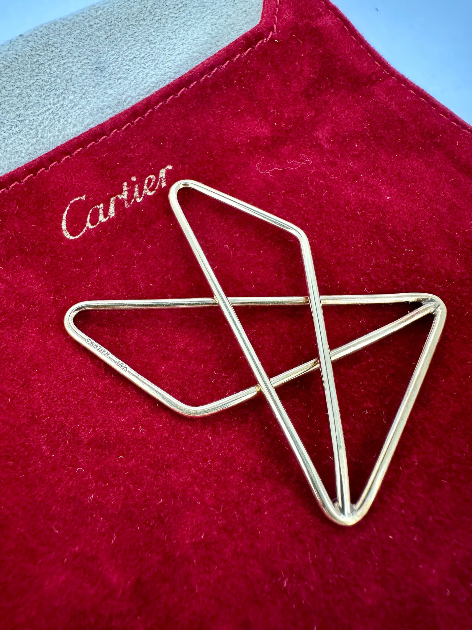 Collectable Cartier Polygonal Butterfly Shaped Money Clip in 14k Yellow Gold: Condition: Like New Brand: Cartier Material: 14k Yellow Gold Clip Dimensions: 2.1" x 1.6" inches. Hallmarks: CARTIER 14K. Weight: 11 grams.