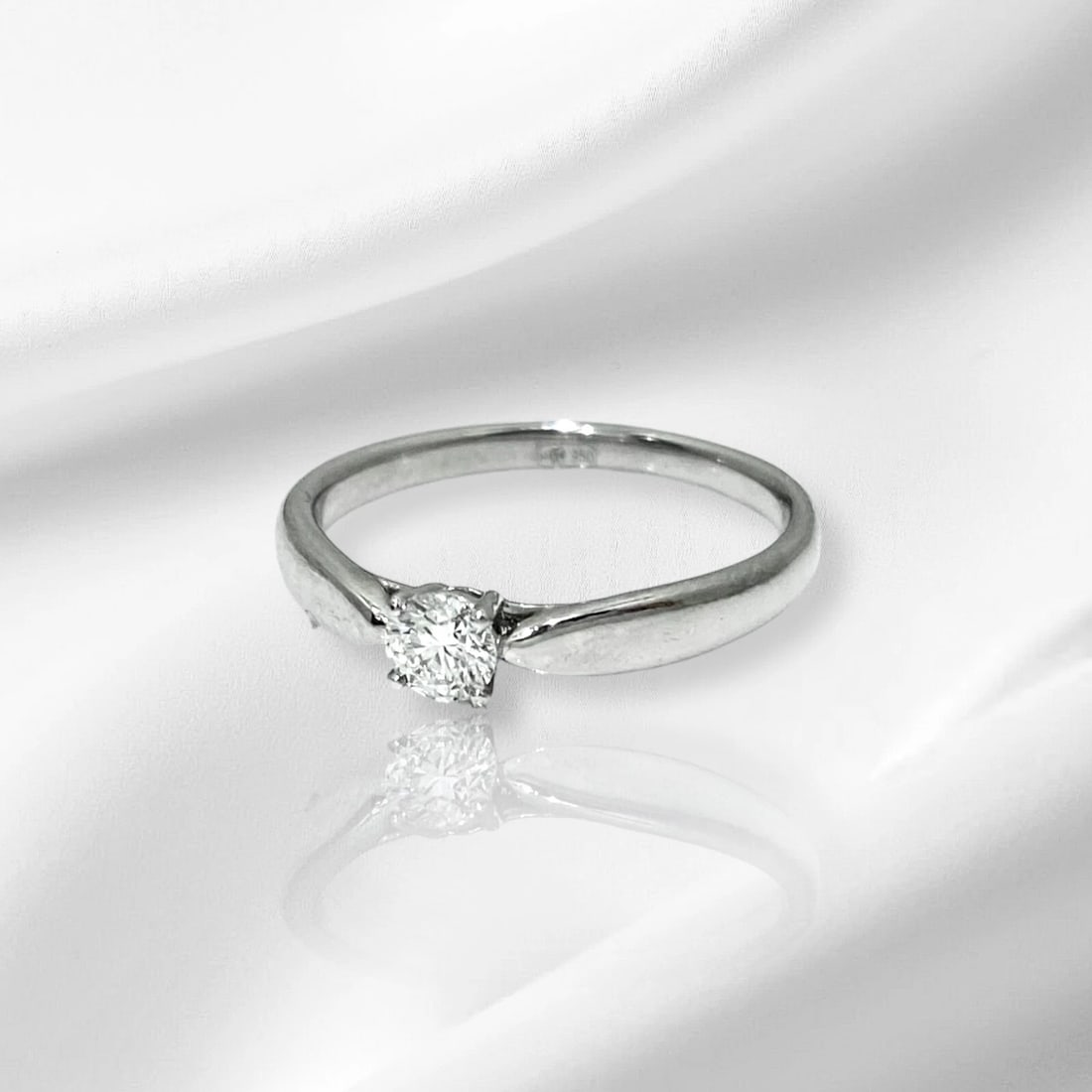 Tiffany & Co Harmony Round Diamond Solitaire Platinum Engagement Ring 0.21 ct: Condition: Like New Brand: Tiffany & Co. Metal: Platinum Gemstone: Diamond 0.21CT Size: 5.75 Weight: 3.6 grams Hallmarks: (c) Tiffany & Co. Pt 950. DO. 0.21 # 698XXXXX Ring comes with Tiffany & Co. po