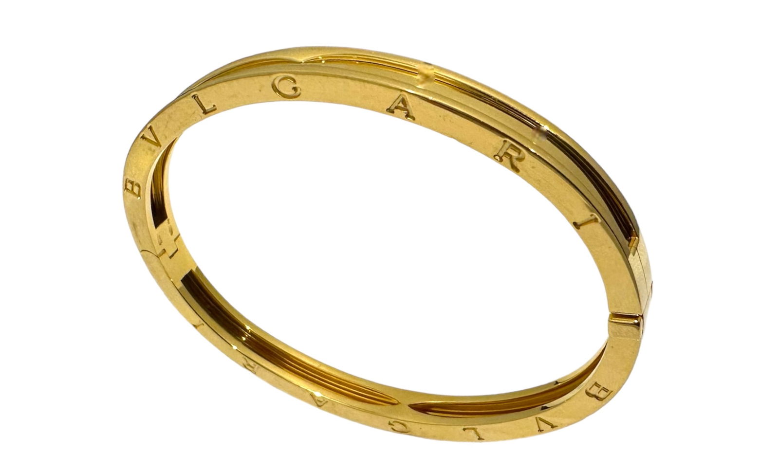 BVLGARI B.Zero 1 Engraved Solid 18k Yellow Gold Bangle Bracelet: Condition: Like new Brand: BVLGARI Metal: 18k Yellow gold Gem stone: No Gemstone. Size: Medium: Wrist Size fits upto 6.5 inches Weight: 27.3 grams Comes with an original box or pouch